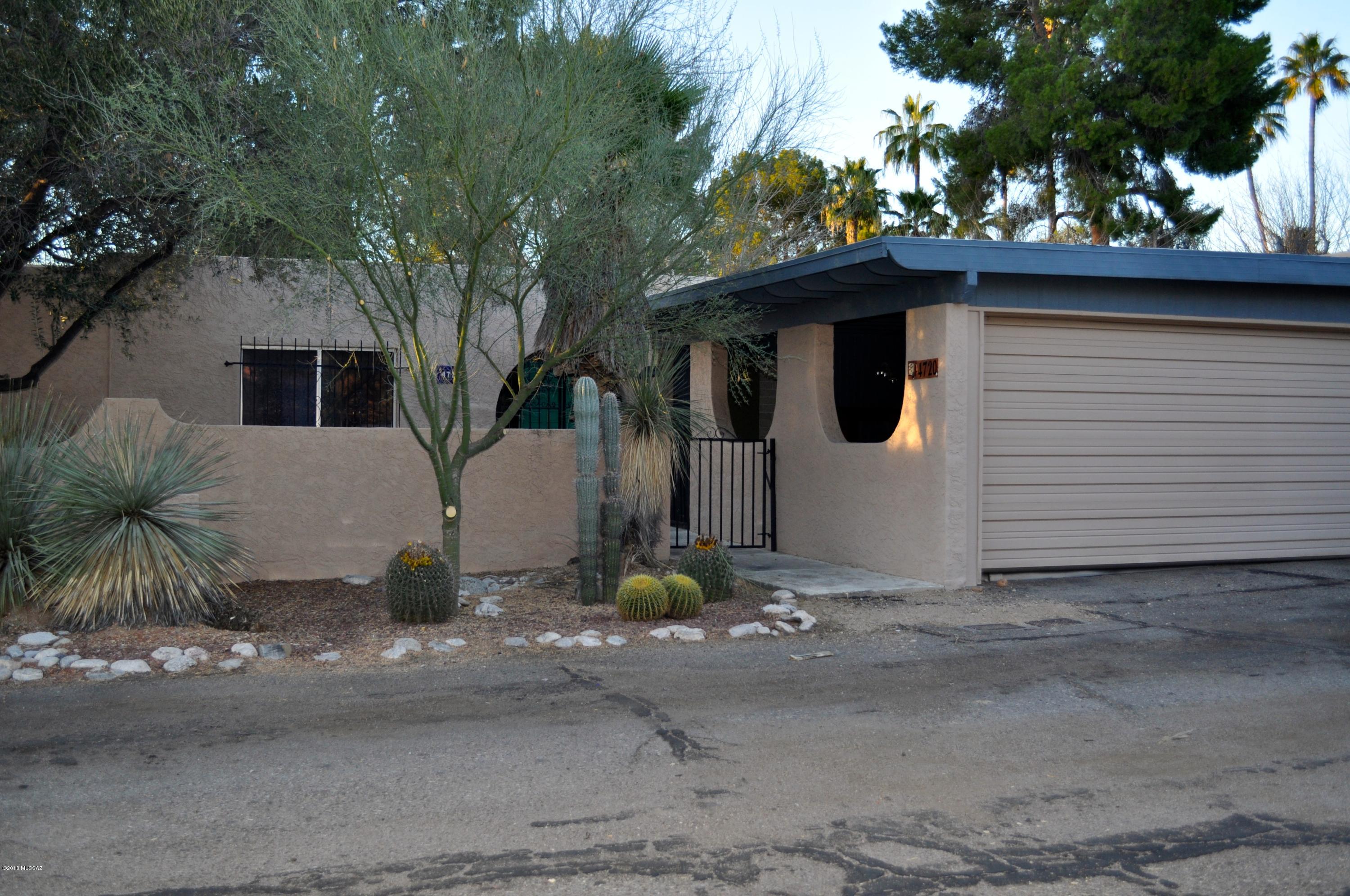 Major fixer-upper! Small, very private community of townhomes off Via Entrada (near River and Campbell). This townhouse has been ''gutted'' due to a flood this summer. Insurance has completed the remediation, and it is ready for your buyers to remodel and make it their own! Wonderful, spacious floor plan with large, eat in kitchen space. Family room with beehive fireplace. Nice covered patio. This is one of the largest units in this community, since it has the enclosed Arizona Room. Backs up to lush, resort-like common area with community pool. Close to amazing restaurants and shopping. A fabulous location convenient to everything!
