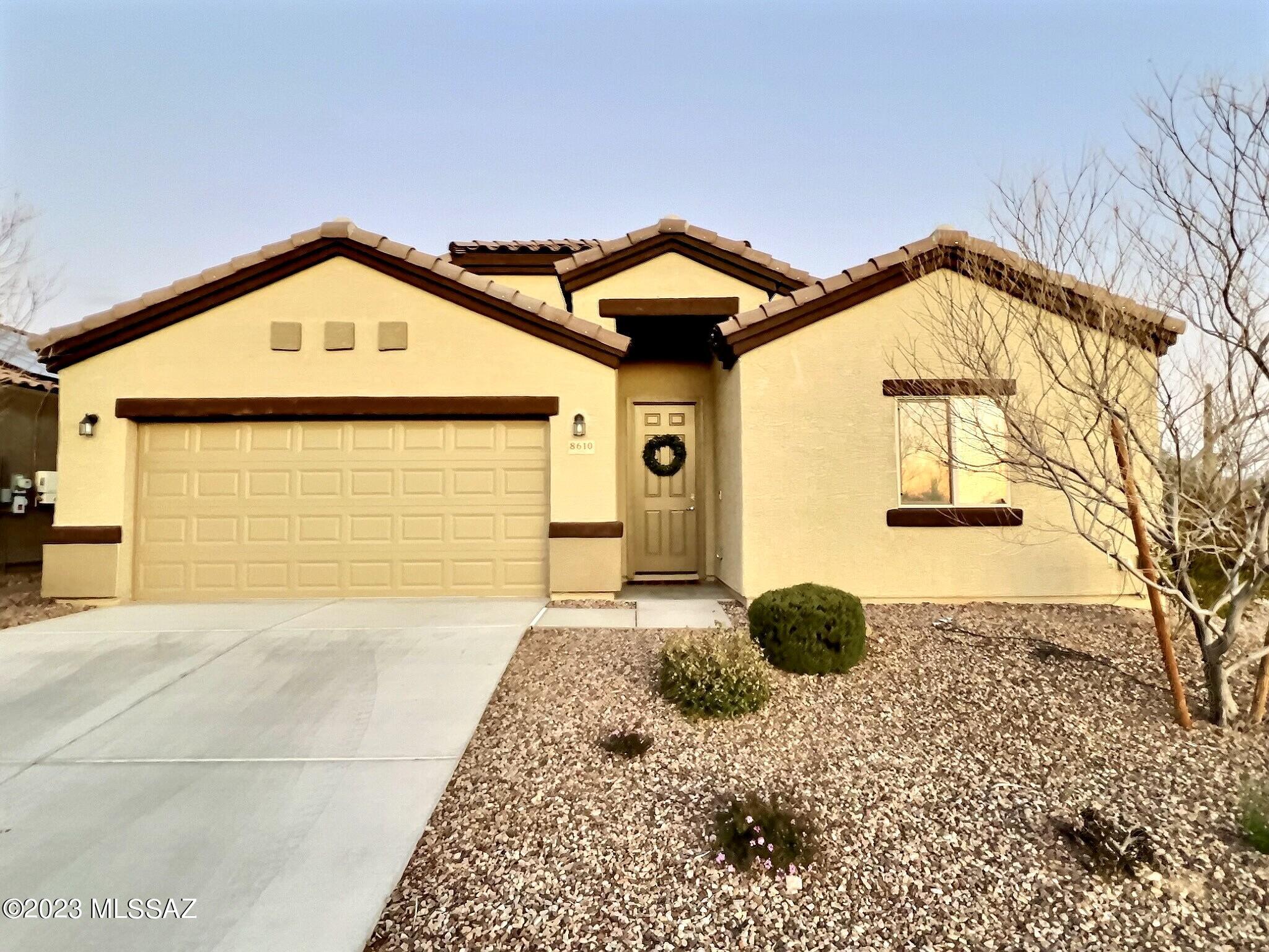 Range pricing $425,000-$445,000. Experience the epitome of comfort and style in this professionally designed turn-key home in NW Tucson. The private yard features mature landscaping, including blooming primrose bushes, fruit trees, and an extended paver patio providing a beautiful outdoor space. Inside, enjoy premium upgrades throughout the home such as granite countertops, stainless appliances, ceramic and vinyl plank flooring, 8-foot entry door, and designer light fixtures. Whether you're looking to relax outside or inside, this property has everything you need to create a warm and welcoming living environment.