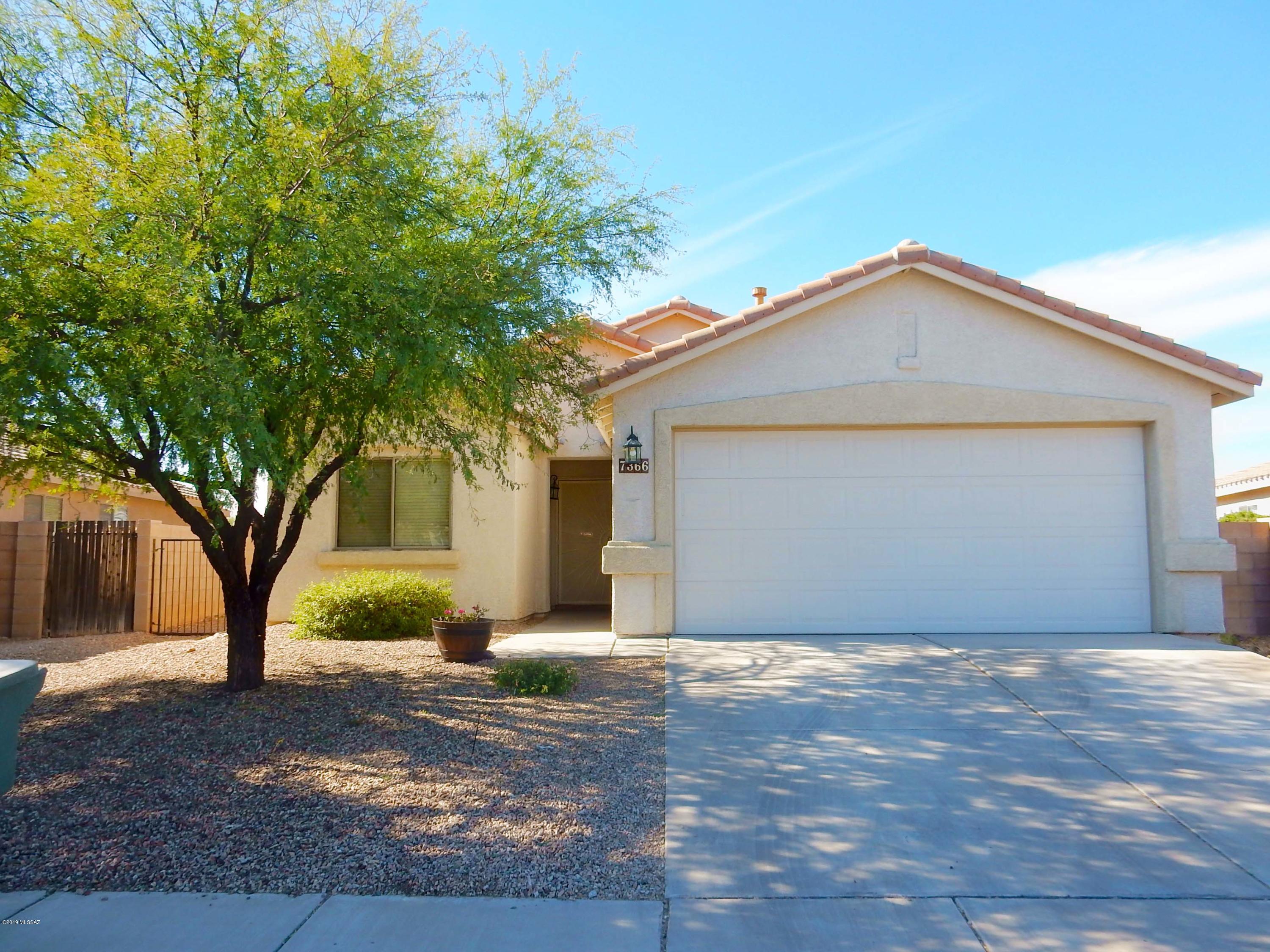 Gorgeous 4 Bedroom Single Story Home for Rent in Desirable Rita Ranch & Vail School District! This spacious 4 bedroom split bedroom design home has 2 baths. Great Room Floor Plan. Kitchen has Island, fridge, gas stove/oven, over the range microwave & dishwasher. Master bath has dual vanities. 2 Car Garage. Washer/Dryer Hook-Ups. Backyard has Covered Patio with expanded uncovered patio areas. Backs up to common green belt. Easy Commute to I10 & Major Employers such as, Raytheon, Amazon, DMAFB. Close to Retail & Restaurants. Minimum 12 month lease term. Renter's Insurance required at lease signing. Pet's require owner approval and additional deposit/fee. No Aggressive Breed or Mix. Sorry No Cats. NON SMOKING Home.