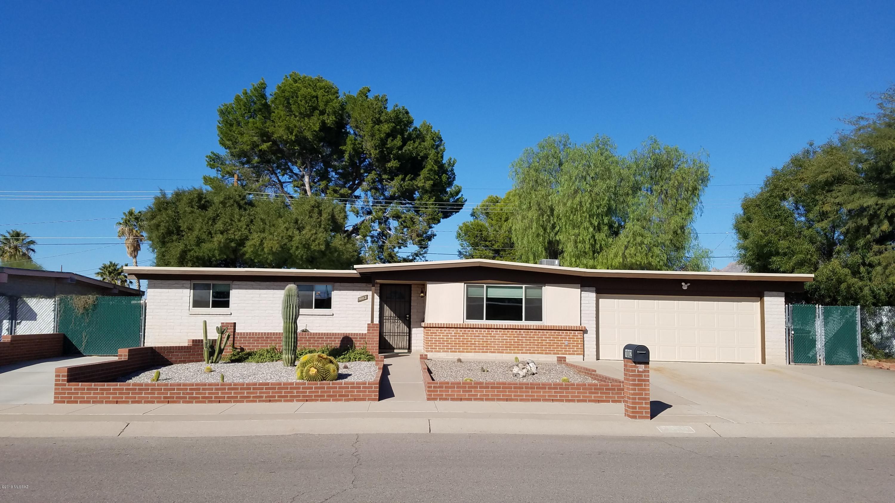 Owner is a licensed Realtor in Arizona. Amazing family home in desirable neighborhood.  Home is less than a block from Children's Memorial Park and The Loop so you can enjoy picnics with the family or sports.   Enjoy your large back yard with covered patio, raised flower beds, shed, built in BBQ and alley access.  Home has 4 bedrooms, large living room and 2 car garage. No HOA with paved off street parking in front for 4 vehicles but still enjoy a nice cactus garden and small patio area out front.  Move in ready with all appliances included, even washer and dryer.