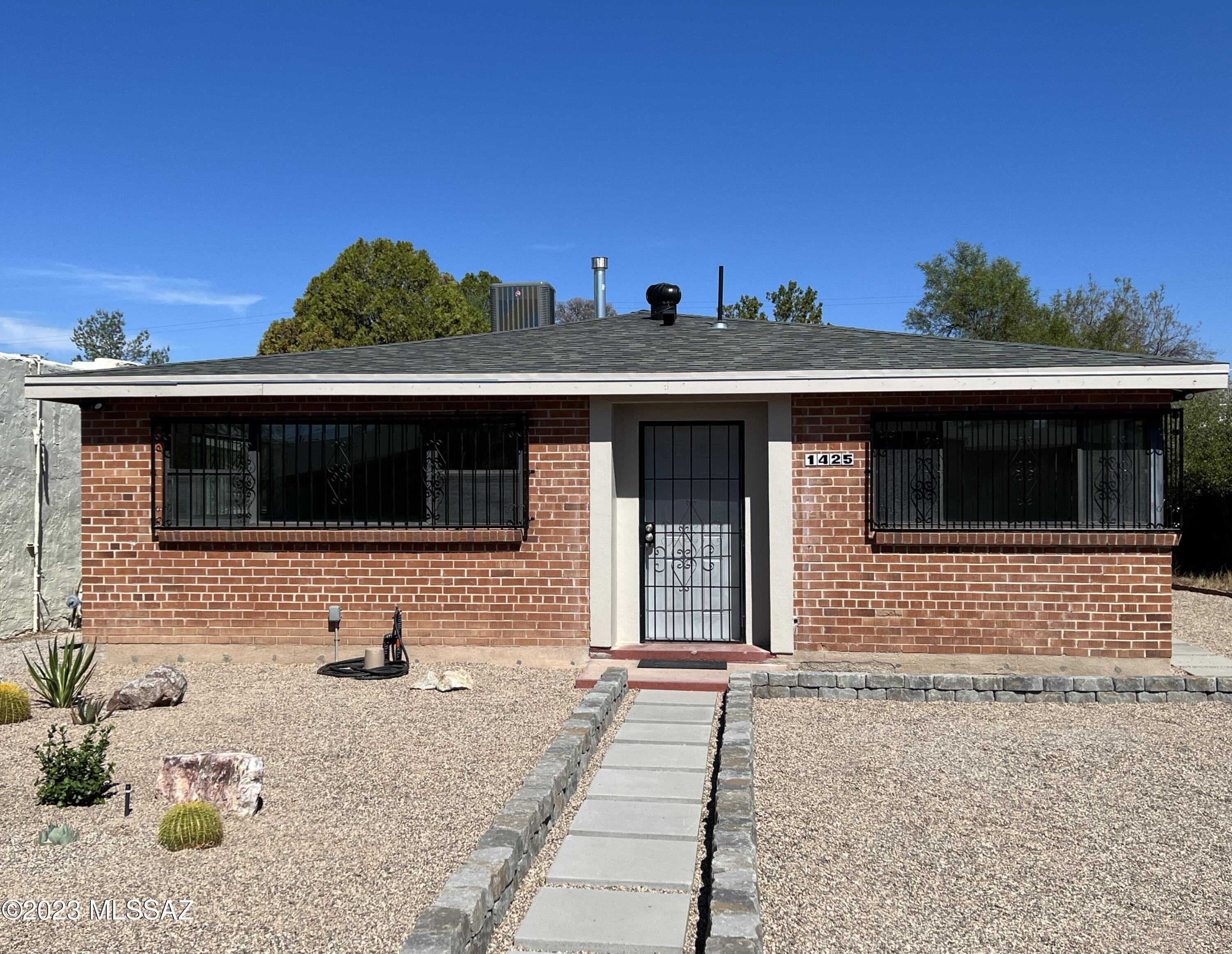 MOVE IN READY - Amazing Central Location! This fully remodeled 3BR/2BA home in the popular Jefferson Park historic neighborhood is conveniently located near the UofA, Banner University Medical Center, restaurants, shops, parks, and so much more. The home features a spacious, open and bright living area, a remodeled, modern kitchen with new stainless steel appliances (incl gas stove) and granite counter tops. Other features include: a new roof, new AC and furnace units, new water heater, updated plumbing and electrical, new flooring and interior paint. The huge, fully fenced in backyard is low care and low maintenance and includes a large storage shed/workshop. Agent - Owner.