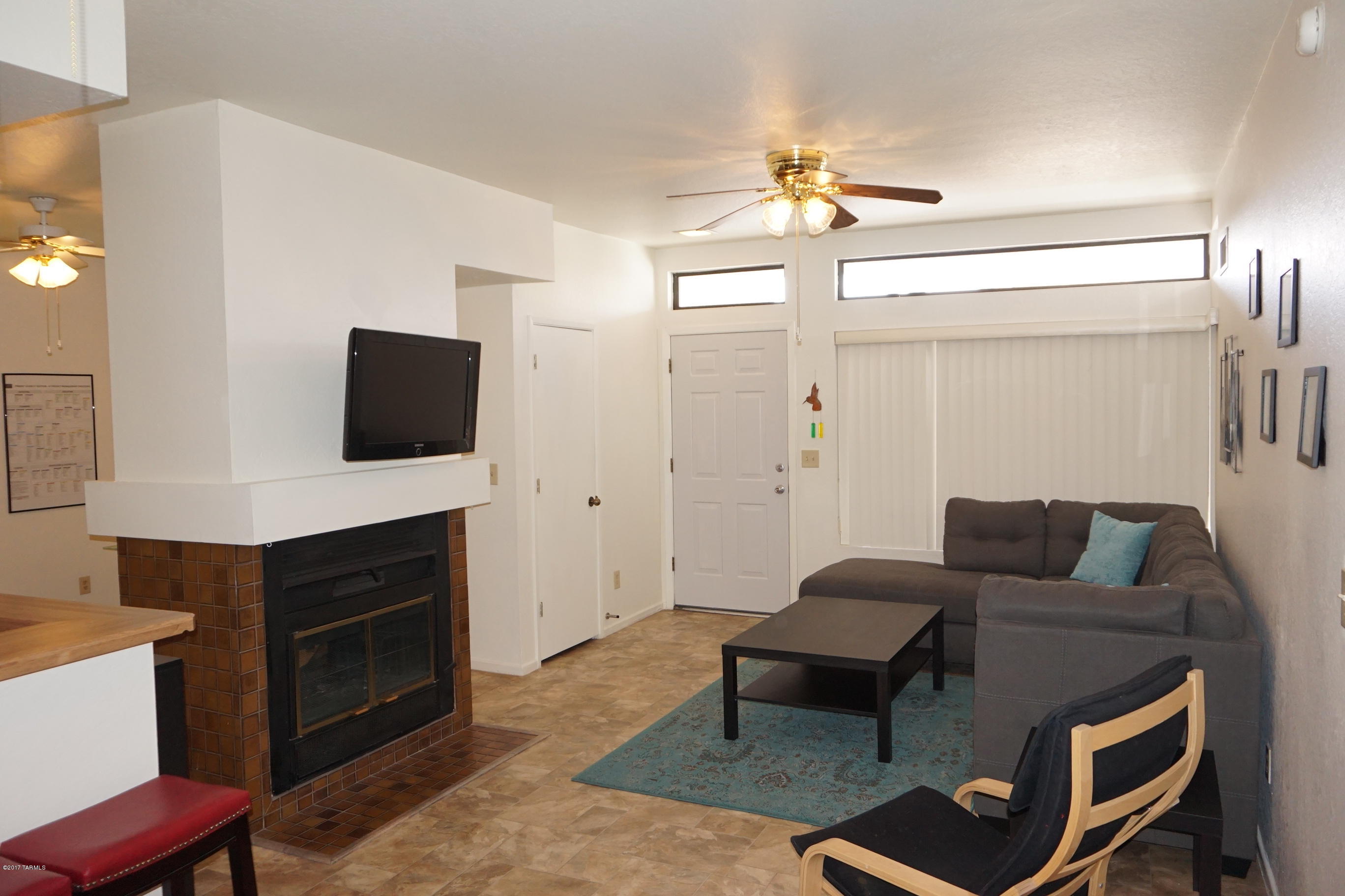 SELLER WILL CONSIDER OFFERS BETWEEN $89,900 AND $93,900. ADORABLE 2 BR/ 2 BA PLUS DEN LOWER LEVEL UNIT WITH COZY DOUBLE SIDED FIREPLACE BETWEEN FAMILY ROOM AND DEN, BRAND NEW CARPET, BEAUTIFULLY REMODELED SHOWER AND DOUBLE CLOSETS IN MASTER, CEILING FANS IN ALL ROOMS, DINING AREA PLUS BREAKFAST BAR, OUTSIDE STORAGE ROOM AND LARGE BRICK PATIO WITH LOVELY VIEW OF POOL. GREAT LOCATION IN COMMUNITY! HOA FEE COVERS WATER, SEWER, GARBAGE PICK-UP,TERMITE CONTROL,BASIC INSURANCE, MAINTENANCE OF ROOF, GROUNDS AND BUILDINGS PLUS TWO COMMUNITY POOLS AND SPAS. (ONE POOL IS ALWAYS HEATED.) THIS IS A VERY COMFORTABLE HOME WHICH WOULD BE PERFECT FOR FIRST TIME BUYERS OR SNOWBIRDS. HARD TO FIND A PLACE THIS CUTE FOR THIS PRICE!ASSIGNED COVERED SPOT IS 186 BUT THERE ARE 4 PARKING SPOTS RIGHT NEXT TO BLDG.