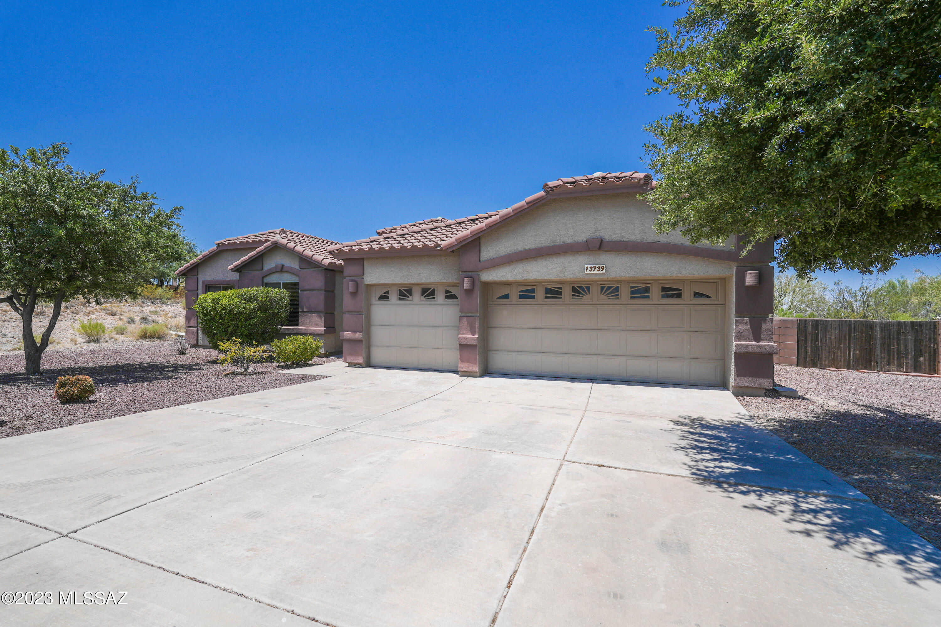NEW PRICE! Premier Vail Neighborhood 1 Story, 4bd, 2.5 Bath, 3,085 SqFt, Split Family Living Floor Plan. Beautiful Eat in Kitchen, Generous Cabinet spaces, Granite Countertops, Island, Stainless Appliances, Gas Stove. Great Room off Kitchen w/Gas Fireplace and Built-in Entertainment Center. Living Room, Formal Dining areas. Private walkout Master Bedroom plus large Master Bath w/separate shower/soaking tub, walk in closet. 3 Bedrooms, full bath off separate hallway. Bonus room could be used as Office/Den. High Ceilings. 3 Car Extended Garage.  1 Acre Lot. Front and Backyard Panoramic Mountain Views. Spectacular Backyard Pool with Waterfall feature, Gas Firepit, large Covered Back Porch, fully fenced back yard. Vail School District. Easy access to I-10 corridor, shopping, restaurants.