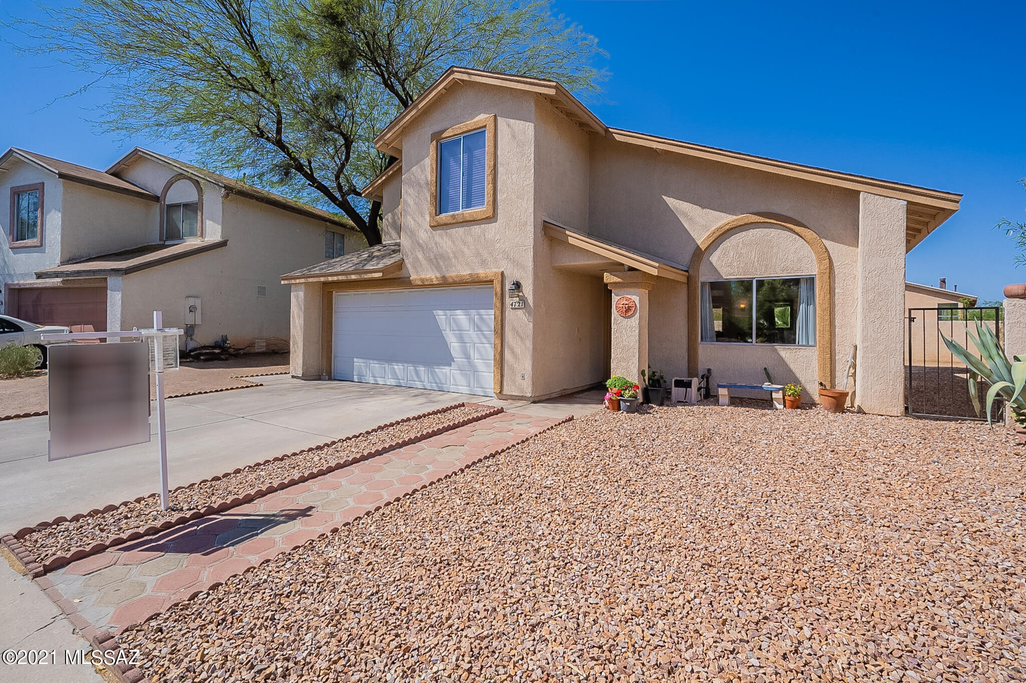 Beautiful, two story family home located in the desirable Northwest side of Tucson. Within two miles of schools (Quail Run Elementary, Tortolita Middle, and Mountain View High School). Only five miles to the Tucson Premium Outlet mall and minutes from numerous restaurants. The house has lots of natural light and a desirable floorplan. The AC until was replaced in 2013. A new roof was installed in 2018. There is no polybutylene pipes in this home. The master bedroom includes a spacious onside suite, perfect for an office, exercise area, nursery or relaxing reading space. Come view this home before it's gone! Listing agent related to sellers.