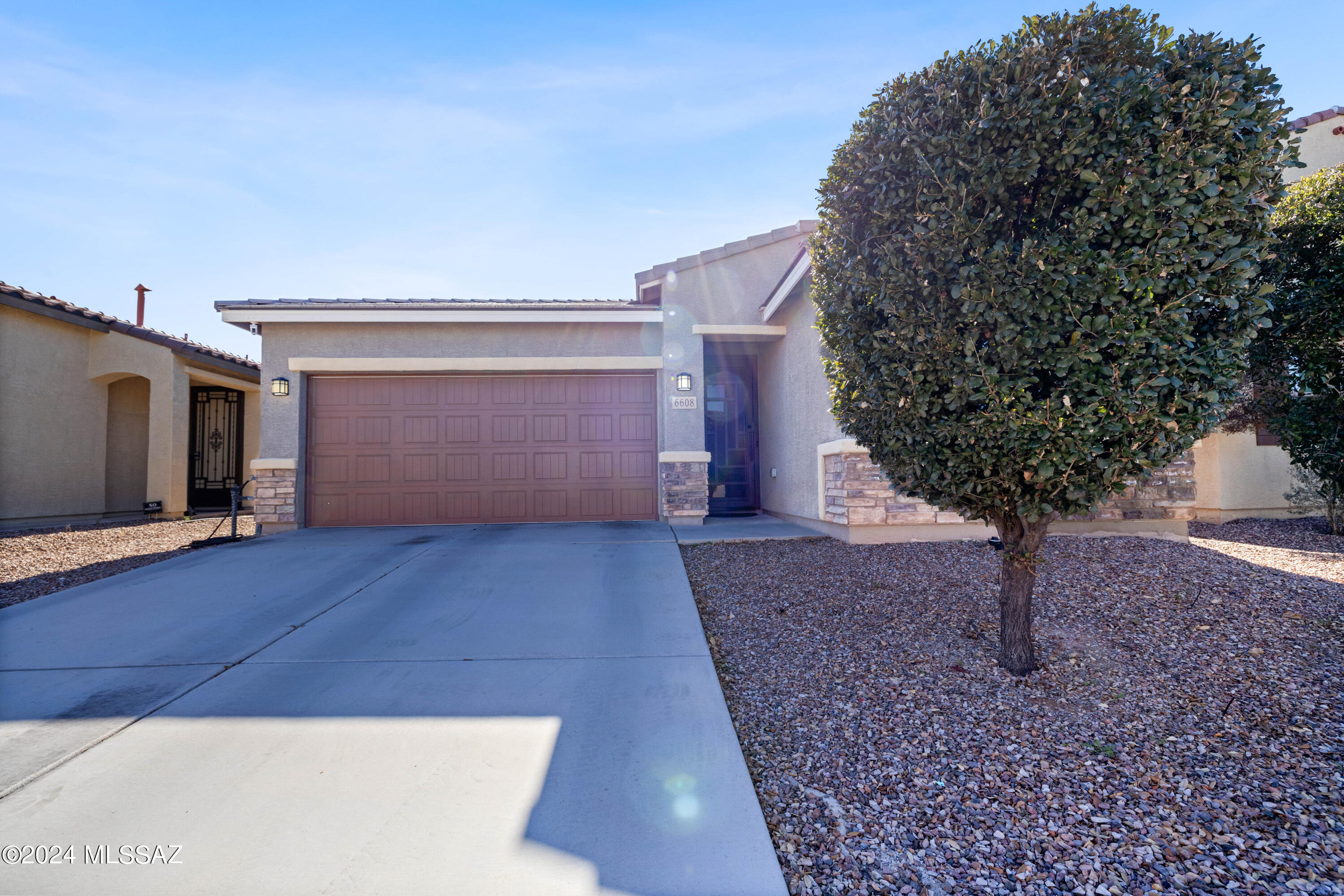 Stunning home with 3 bedrooms, 2 bath in an energy-efficient Meritage built home located in the sought after Vail school district. Granite countertops, custom tile backsplash, above cabinet lighting, corner pantry, updated lighting fixtures and stainless-steel appliances. The split bedroom floor plan offers a large owner's suite with a bay window, barn door to the bathroom w/ dual sinks, walk in shower & large tiled walk in closet. Outside enjoy the backyard with PebbleTec pool with water feature, covered patio, gazebo with electric to it, beautiful pavers, turf, & built up walls for additional privacy perfect for entertaining. Solar already installed for lower utility costs! This home is located in the highly sought after Vail School District & the community of La Estancia featuring parks, playgrounds, splash pad, and pool. Conveniently close to I-10, DM AFB, Airport, UA Tech Park, Raytheon, Amazon & Tucson Loop.