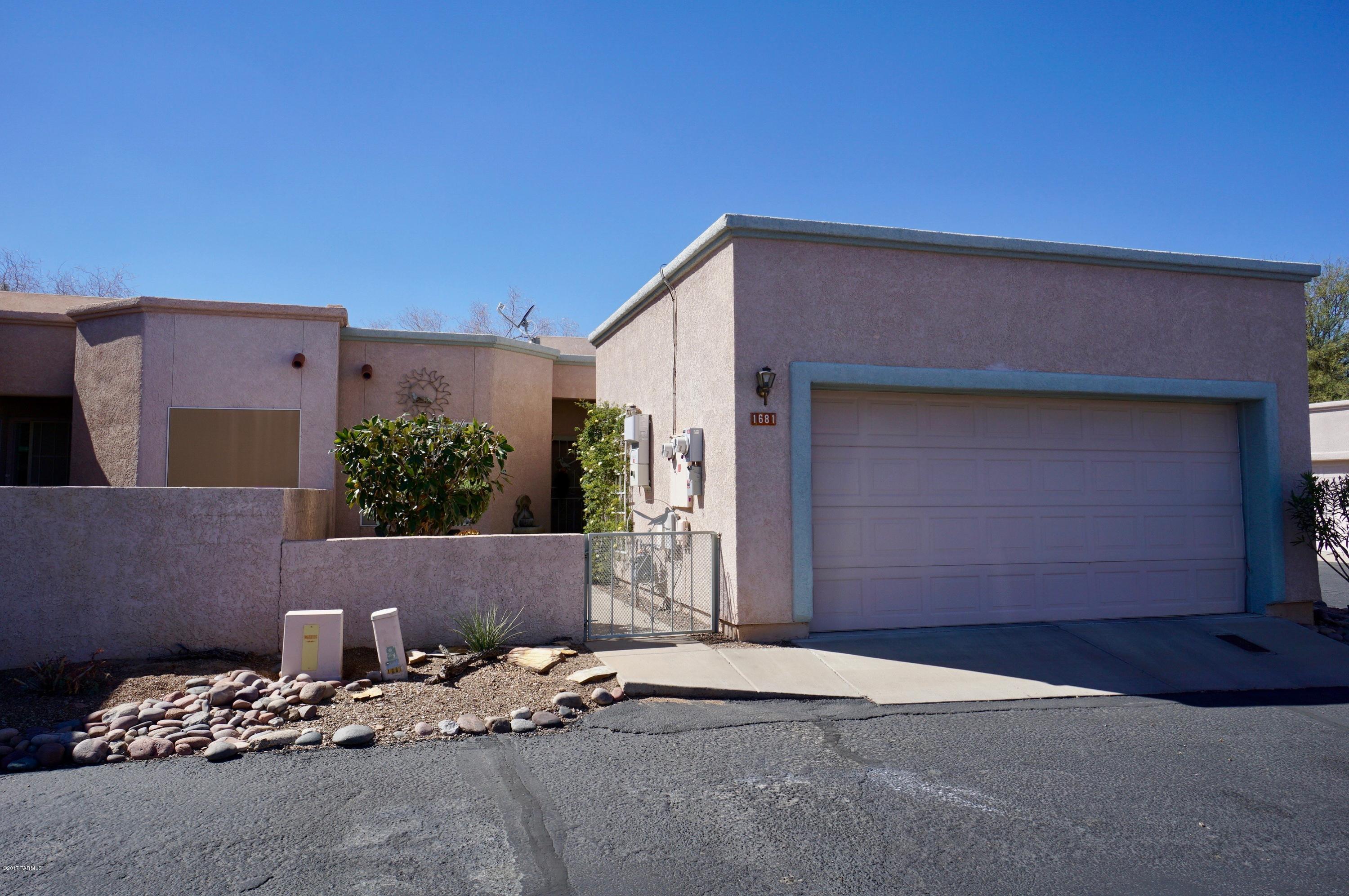 What a great value! Immaculate and nicely appointed end unit 2BD/2BA townhome in Colonia De Los Alamos. Open floorplan with tall ceilings and clerestory windows. Spacious bedrooms plus den, 2 full baths. Living/dining room combo with gas fireplace. Updated kitchen features breakfast nook and plenty of cabinet space. 2 car garagewith extra storage & utility sink. Large covered rear patio. Lots of upgrades throughout. Make this affordable home your next home! 55+ adult community.