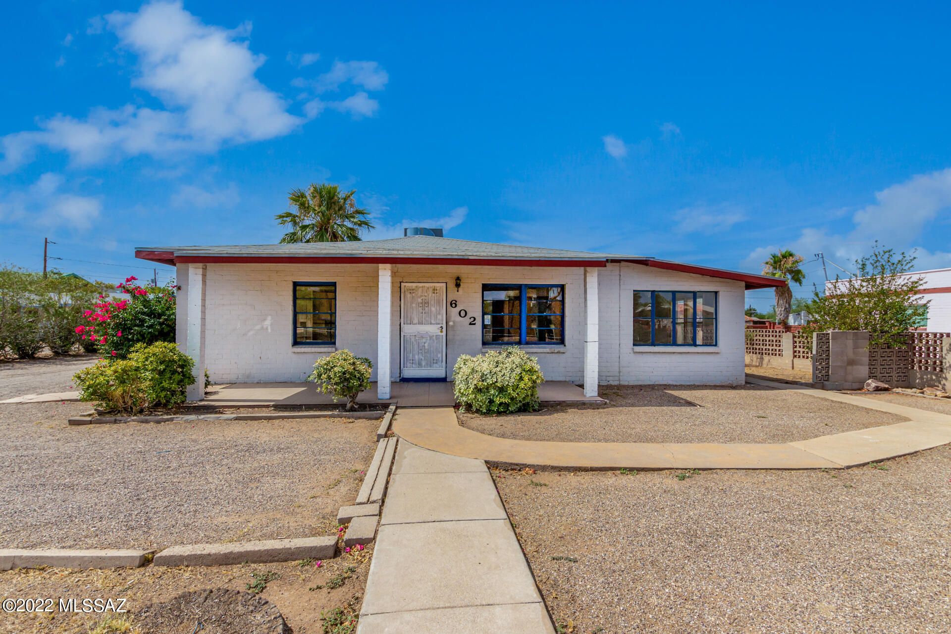 Great opportunity located in Central Tucson. Zoning allows for either commercial or residential. Previous set up was 5 Separate Offices,2 Baths & a Reception Area. Wired For Security & Phone.  Could be easily converted to make a 4 bedroom home. Come take a look at the potential. Hard To Find Free-standing Office Building! Great Price! Great For a CPA,Attorney, Real Estate, Counseling, Insurance. Easy Access to Downtown and Fwy.