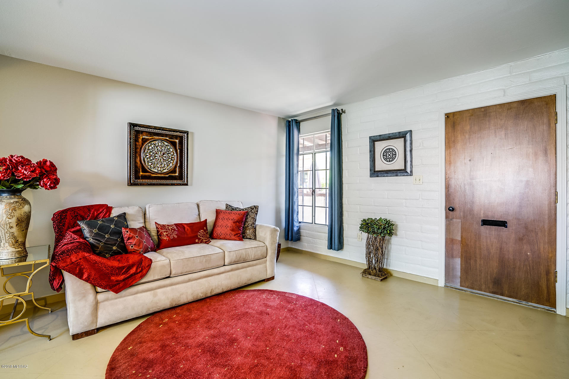 Charming Villa in the HEART of Green Valley, feet away from shopping.  Fresh interior paint and stunning concrete stained flooring.  Furnishings available by separate bill of sale.