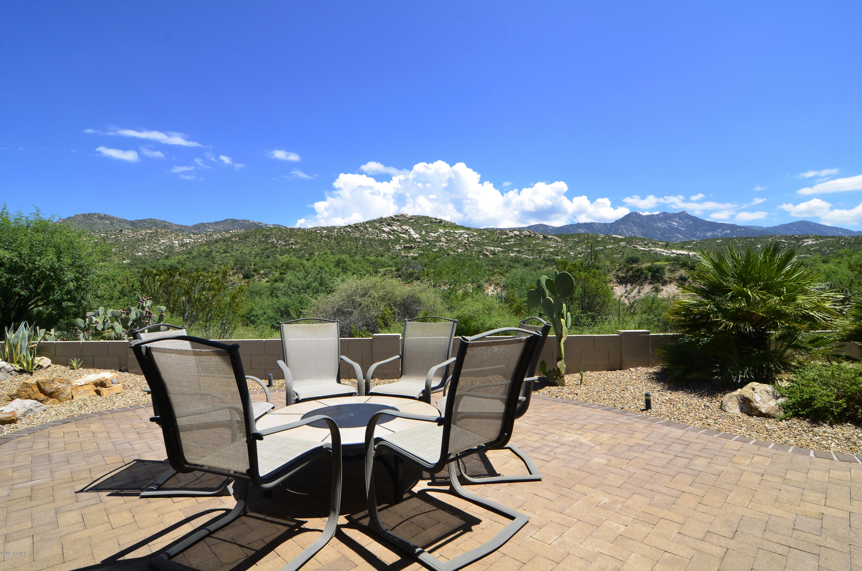 Extremely Private & Peaceful Home Tucked in a Secluded Setting. Clean, Durango Model with Unobstructed Catalina Mountain & Pristine Sonoran Desert Views. Bright Kitchen with Stainless Appliances, Solid Surface Counters, Center Island, Breakfast Bar & Desk. Dining Area with Views. Open Family Room Off of Kitchen. Living & Dining Room for Entertaining.  Downstairs Master Suite with Bay Windows & Large Walk-in Closet. Generous Master Bath Soaking Tub, Separate Shower & Dual Sink Vanity. Large Office & 3 Additional Bedrooms for Guests & Hobbies. Recirculating Pump. Laundry Room with Cabinets. Extended 3-Car Garage with Epoxy Coated Floors & Storage Cabinets. Tranquil Outdoor Living Space with Full Length Covered Porch, Extended Brick Paver Patio & Mountain Views. Freshly Painted & New Carpet
