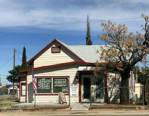 Tombstone Real Estate Office is for sale but owners are willing to lease back. OPPORTUNITY PLUS!! This property is perfect for residential or commercial with great highway access. Late 1800's - early 1900's charm offers 2 bedrooms, 1 1/2 baths. Included is a darling remodeled detached efficiency apartment, fully furnished with a kitchenette and bath that is perfect for a vacation rental or guest quarters. The Studio is named the ''Chicken Coop'' as rumor has it, it was actually a chicken coop a 100 years ago! The main building has a newer roof and beautiful refinished wood flooring in the large great room. Large corner lot with plenty of parking. You must see to appreciate this property. Could be remodeled into 3 rental units! Sellers are brokers in State of AZ.