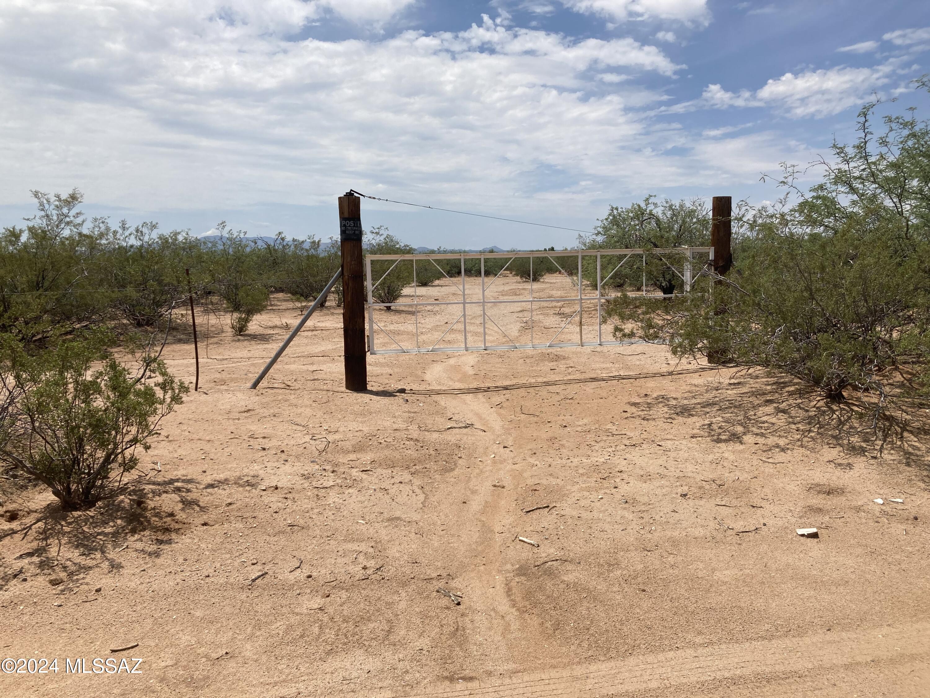 Whether you're dreaming of a sprawling ranch, a peaceful retreat, or a sustainable living setup, this land is a blank canvas waiting for you. 20 Acres Unrestricted Land-Mobile Homes and RVs Okay!  Can subdivide into 4.1-acre parcels. Electricity is on the property. Drill well or haul water and add septic. Suitable for custom-built home, mobile home, or even tiny homes. Horses, animals, and agricultural ventures are allowed—check with the county to verify. The land is located in a flood plain, so just ensure you build elevated structures as per county guidelines - either 2 or 3 ft. up. Certain businesses are permitted in the area, offering a unique opportunity for those looking to combine work and home life in one serene location.