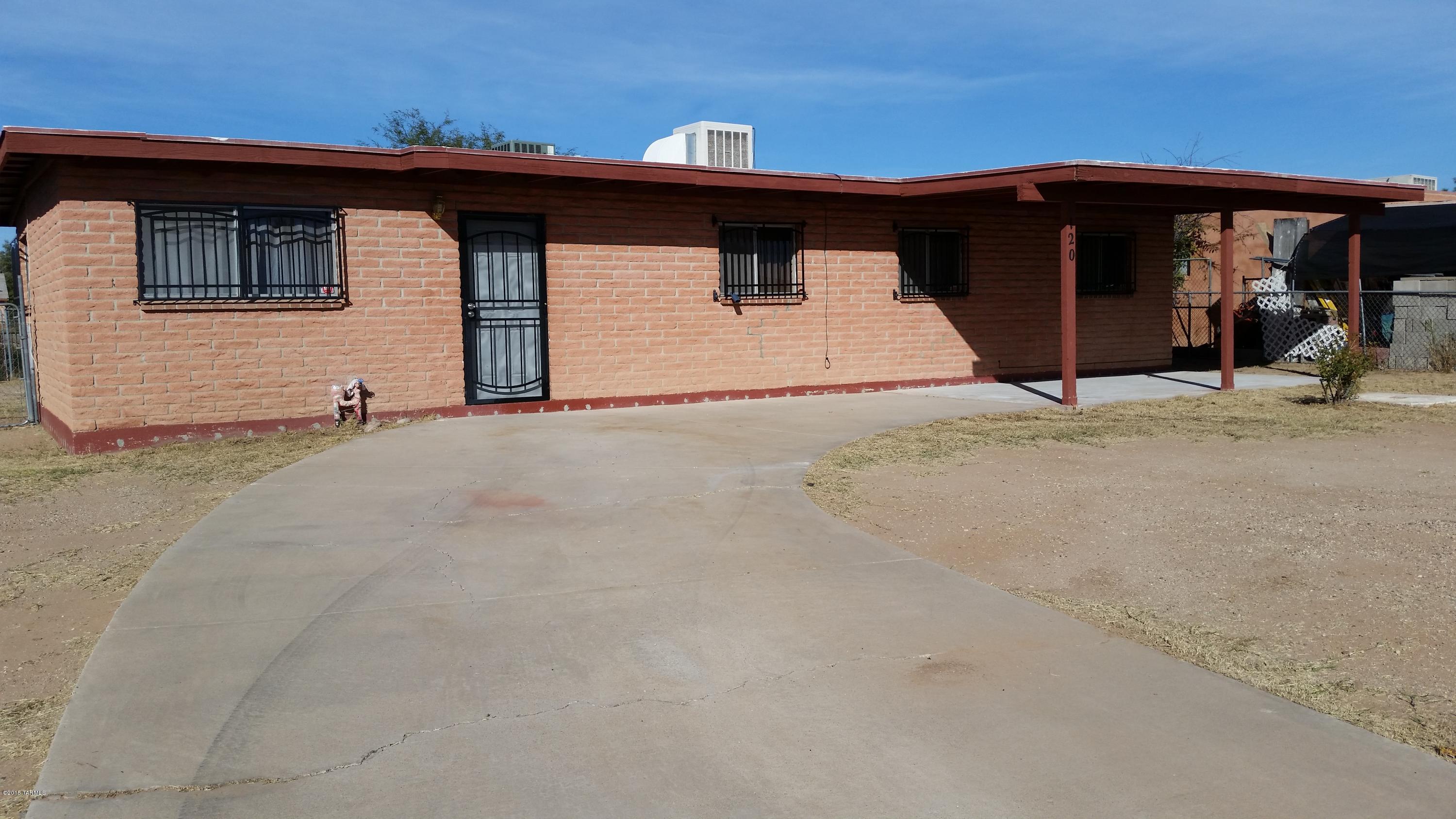 Nicely updated 4bed 2bath house.  Large fenced yard and laundry area in storage room.  A/C and evaporative cooling.