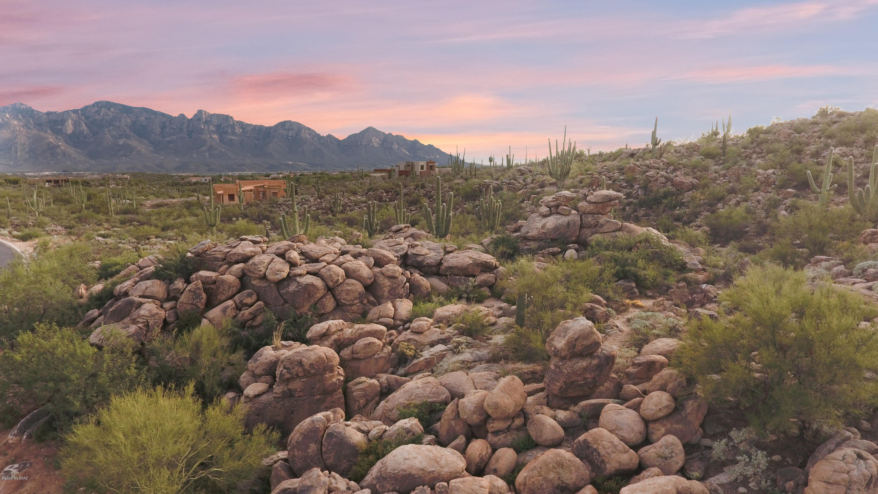 One of Stone Canyon's finest lots! Expansive views of the Catalina Mountains are complimented with natural rock croppings and lush vegetation.  Enjoy the privacy of this perfectly appointed 2.5 acre lot.  Your dream home awaits!!!
