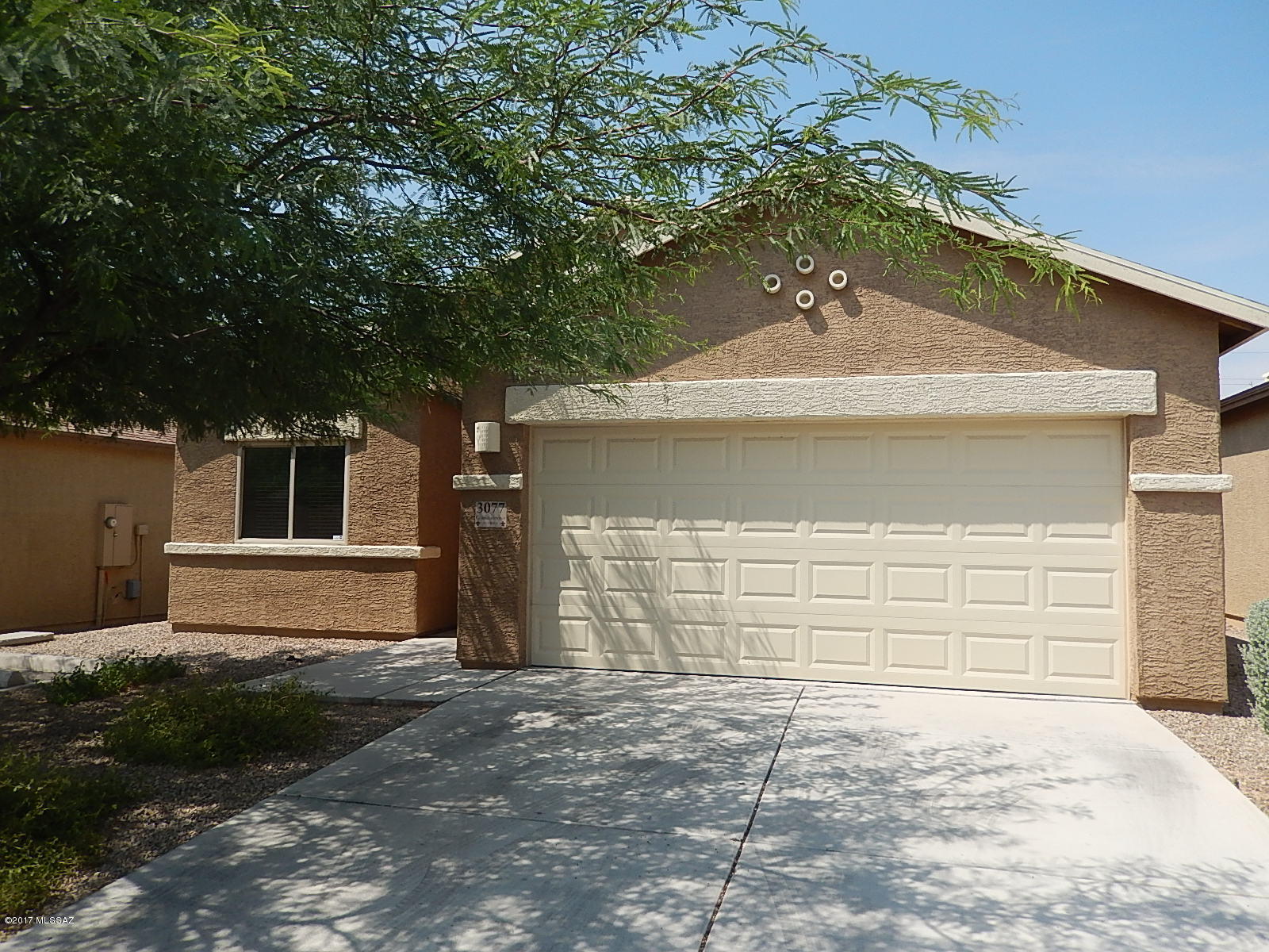 Upon entering this 4 bedroom home, you'll notice the vaulted ceilings and open floor plan. Kitchen has plenty of cabinet and counter space, breakfast bar and newer appliances. Bedrooms are good-sized and master comes with separate shower and tub and large walk-in closet. Yard is super low maintenance. This home is available today! Call for your private showing.