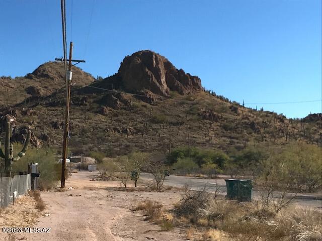 Mobile Home on 1.14 Acres of horse property at the base of a saguaro-studded mountain. Quite paved road with stunning views. 
Very close to shopping, necessities and casino yet feels very remote.
No HOA, No Deed Restrictions and no CC&R's.
Mobile home has new roof after severe storm damage. Interior repairs not completed. Home is being sold ''As-Is'', Seller is unable to make any repairs.