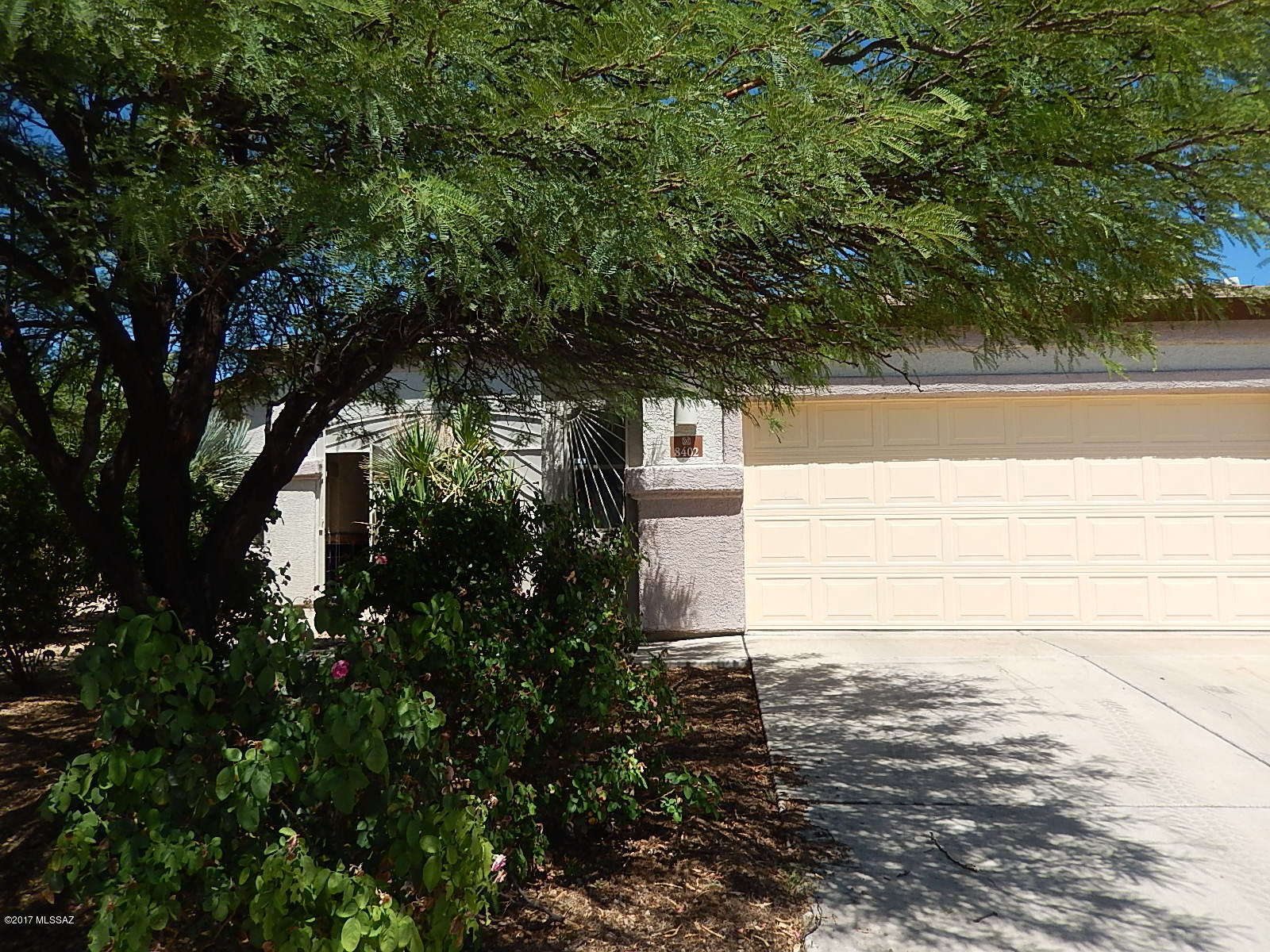 This 4 bedroom/2 bath home will be available soon! Home has private secured entry that leads into a wide open living space with custom tile floors, formal dining area with beautiful light fixture, fireplace, and custom draperies and blinds on all windows. Kitchen comes with loads of cabinet and counter space, all appliances, breakfast bar and separate dining area. Rooms are all good sized and provide tons of privacy. Master bedroom has it's own entry to the massive built in Arizona Room. Arizona room is a one of kind room. Comes complete with custom tile, 5 outdoor fans, 3 separate entries, and tons of space for entertaining. There's plenty of room for everyone in this home and so many wonderful features but, why not see it for yourself? Call for your private showing today.