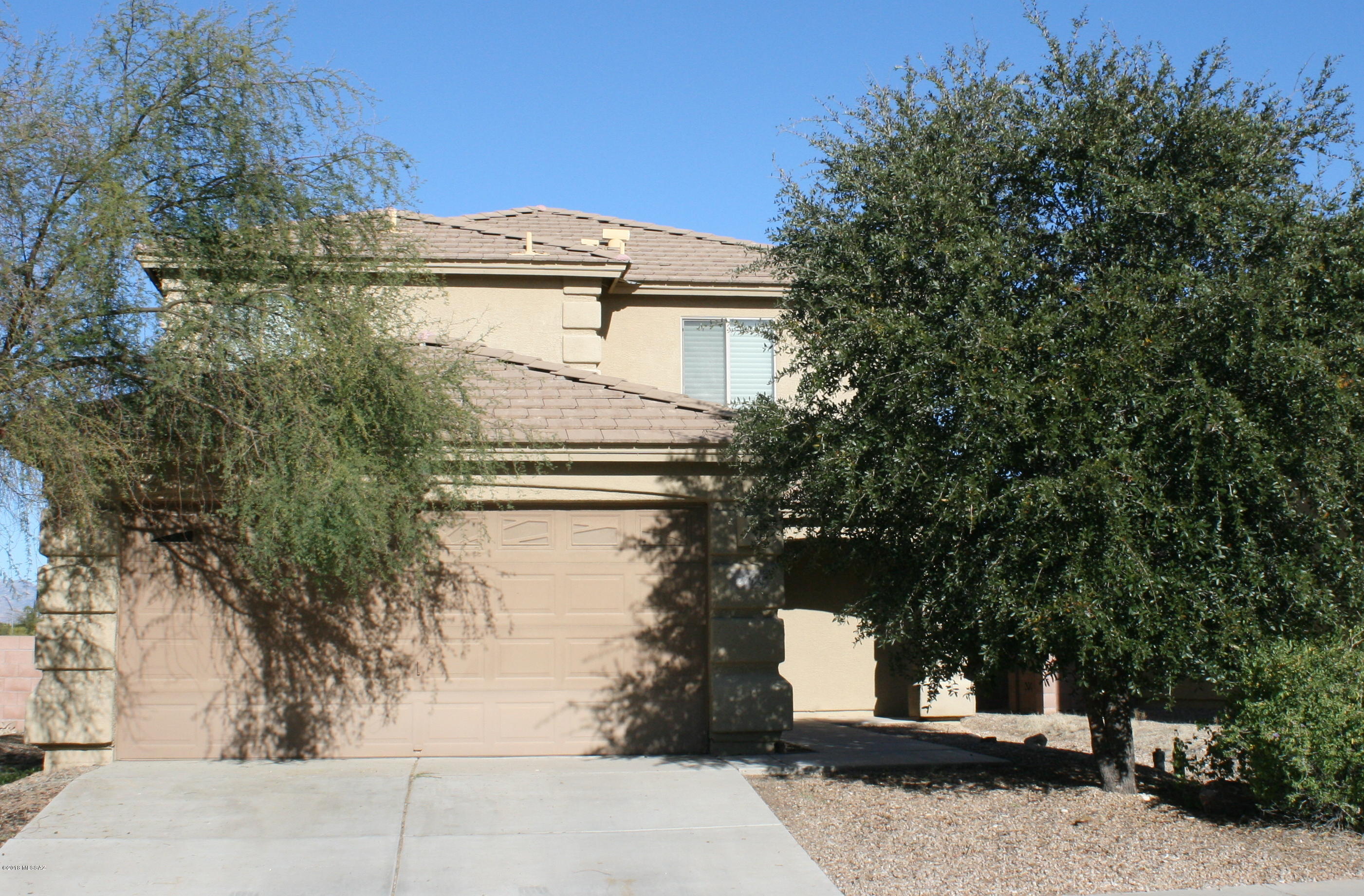 Great 4 bedroom home with a swimming pool, perfect to enjoy those mountain views! This home backs up to the Pantano Wash, allowing for privacy and a great view. This split bedroom floor plan has the master downstairs and a large loft upstairs. This home also has a great room, providing a very open feel when you enter in to this home - great for entertaining! This home is well maintained and ready for move-in! This property qualifies for Pathway to Purchase! Don't hesitate to schedule your appointment to see this amazing home today!