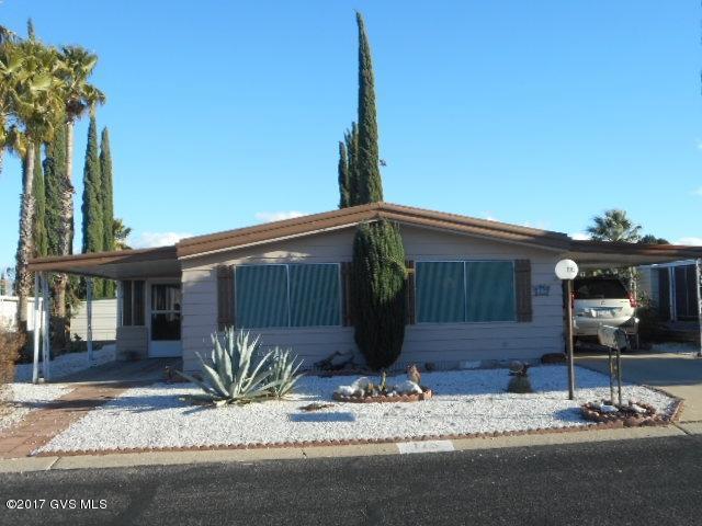 Fully furnished spacious 2 bedroom, 2 bath home. Living room, dining room combo. Eat in kitchen that has a pantry and lots of cabinets. Den with glass slider to a huge glassed in Arizona Room (not included in square footage). Bonus/laundry room with cabinets and desk can be used as office/computer room. Workshop/storage with a little patio behind that has some mountain view. HOA $50.00 MO. include trash pick-up once a week. Great recreational facilities include Heated Pool and Spa, Library, Ceramic, Billiards and Exercise Rooms. Shuffle Board, Horse shoes and Bean Bag Toss. Subdivision is located close to Shopping, Quality Medical Care, Restaurants and Golf Courses.