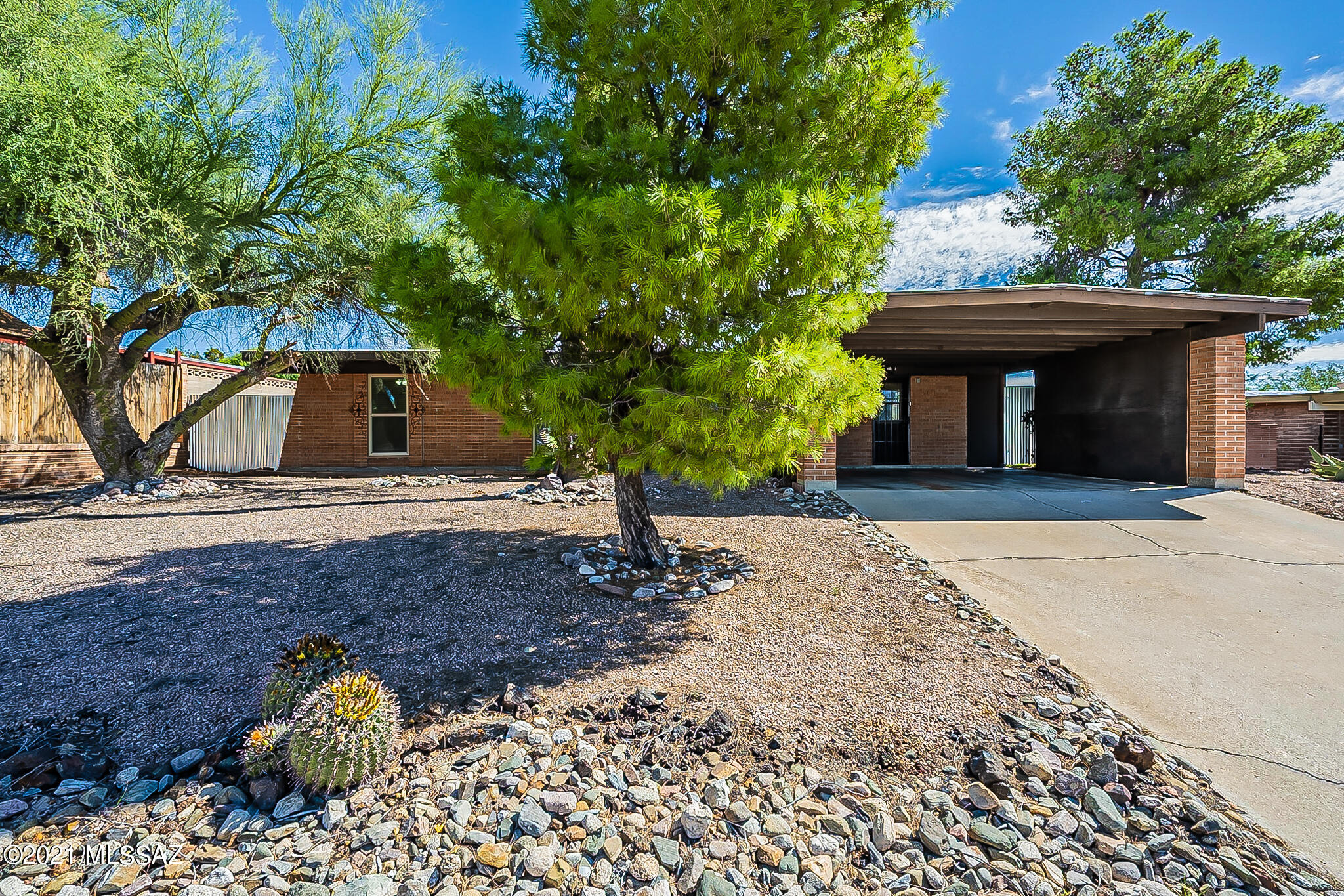 Wonderful east side home under $300k.  This home is beautifully located and can get you everywhere Eastside Tucson in 15 minutes or less. A great floor plan with 4 good sized bedrooms and 2 bath rooms give you lots of flexibility in how you live in the space.  The backyard features enclosed screened in patio, turf and a sturdy corrugated metal and brick fence.  Windows are updated and the HVAC has a manufacture date of 2017. The kitchen features lots of counter space and cabinet space. This house features no carpet . This home has everything you're looking for, check it out today!