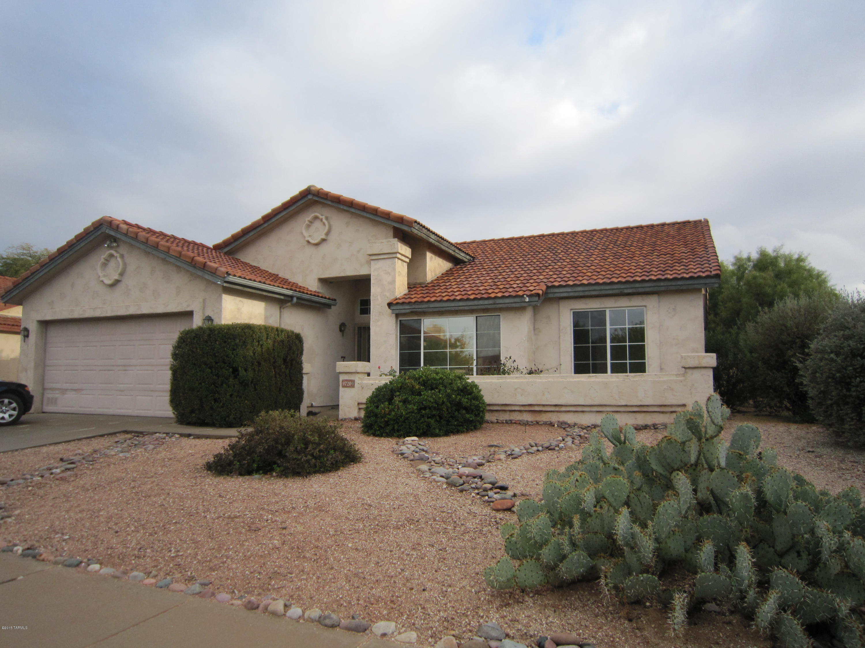 Great Eastside neighborhood! 3 BR, 2 BA Home with Double Garage, open floorplan, double garage, central AC, Fireplace in living room and large covered patio with walled yard. Ceramic tile in living areas, Dining area off kitchen with mountain views.