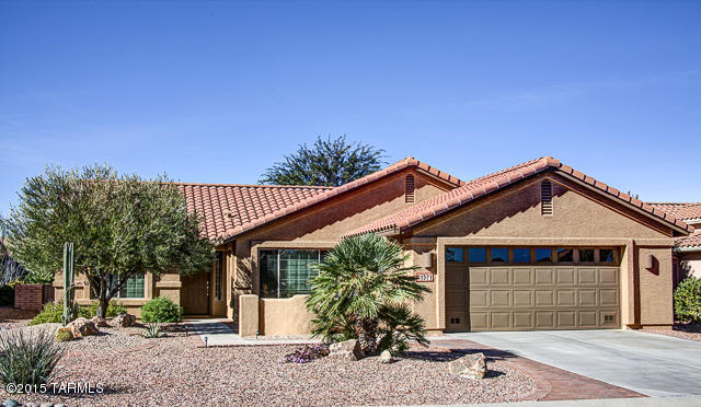 Split Bedroom plan: 2 Bedrooms, 2 Baths, Great Room & Den! Tile everywhere except Den & Guest Bedroom w/carpet. Master has a Bay Window, Dual Vanities in the Master Bath & Large Walk-in-Closet. Kitchen has an Island, Pantry Closet, Breakfast Nook, Smooth top Electric Range, & 42” Maple Cabinets w/a Wiley Brown Stain & pull-out drawers in all Lower Cabinets. Kitchen also has Under Cabinet Lighting. The Den has doors at the entry so it can easily be used as a 2nd Guest Room. Den also has a Built-in Desk area w/shelving. 2 Foot Extended Garage w/Built-in Storage Cabinets & Water Softener. Covered Porch w/an Extended Patio that has a Built-in Barbecue area w/seating surround - perfect for entertaining! New PVC irrigation system installed summer 2015. View this house and make it your home!