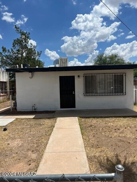 Work has already been done. New paint, new carpet, new evaporative cooler, new hot water heater, roof just recoated.  This cute Bungalow is ready for her/his new owner.  Located near 6th & Ajo Way.  Easy access to transportation, schools and shopping. Right around the corner from the VA Hospital.