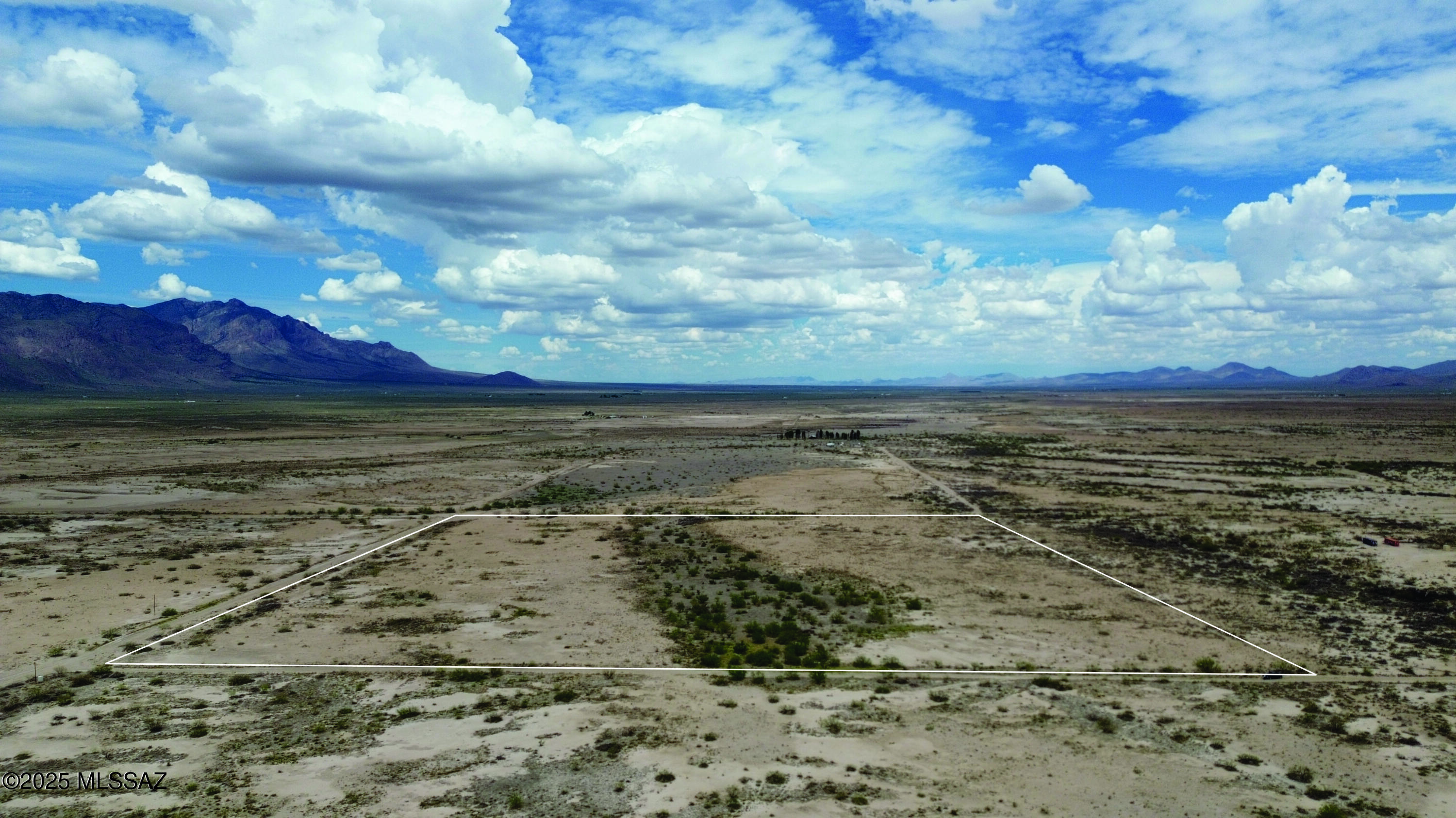 Here is a beautiful almost 41 acres of Cochise County RU-4 zoned property. Property is level and ready for you to start your Arizona Outback dream. There is electric power available or install solar. Perfect to look at the views of the nearby mountains. Relax at night looking at the stars you will never see in the city. Seller financing is available with $7900 down plus closing costs, at 9.9 percent interest for 10 years for a payment of $289.51 plus Pioneer Title monthly processing fee and impounded property taxes