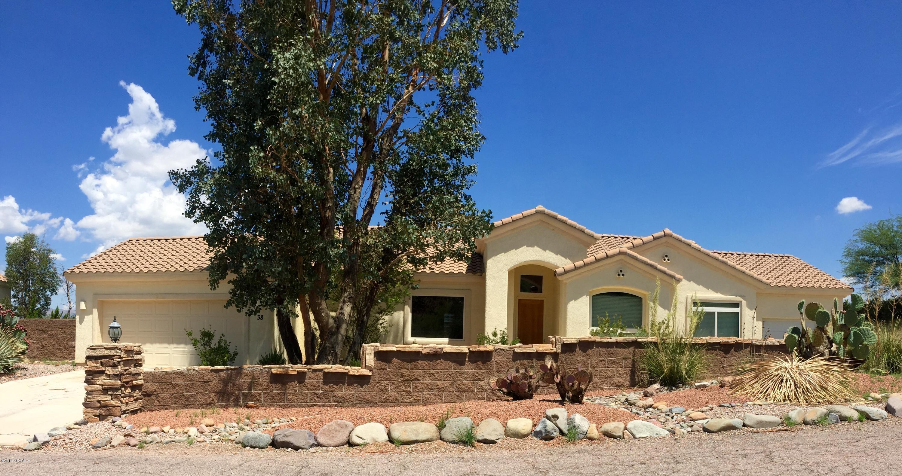 Welcome to your private and spacious home. This property features an open concept, with spectacular views of the San Cayetano Mountains and Rio Rico Golf Course. It also has a large master bedroom with an extended walk-in closet. Great size kitchen with a lot of storage and granite counter tops. Plenty of space between Breakfast and Dining area to host any holiday. Don't miss out on the opportunity to own a custom home, in immaculate conditions.