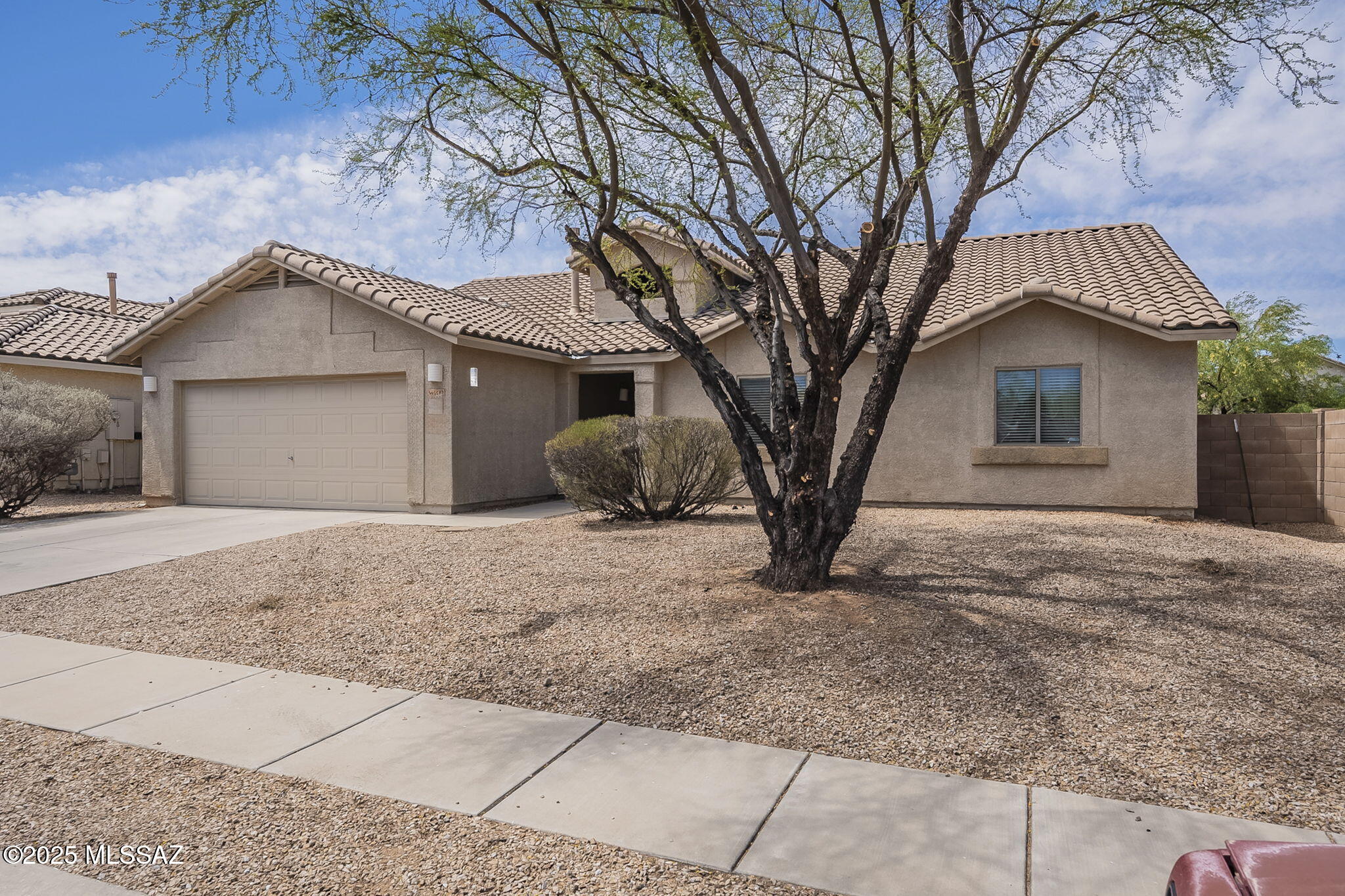 Your next home awaits you in the highly desirable Star Valley subdivision! This four bedroom , 2 bath home sits on a beautiful lot and includes a large backyard fit for your entertainment. The home is equipped with a spacious living room, family room and bedrooms with newly installed tile. The master bedroom includes a large walk in closet while the front and backyard offer low maintenance landscaping. Come see this southwestern home today!