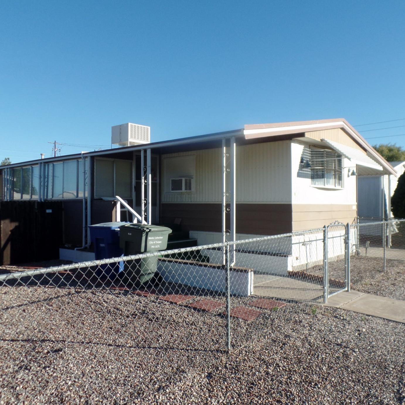 This is an affixed manufactured home in Alvord Estates on land that you own. The HOA dues are only $10/month. 

A new AC and heat pump system were installed in May of 2016. Enjoy lunch on your covered patio by the 10,000 gallon in-ground swimming pool. There are also two storage sheds, one of which is very large and insulated. Roof of home just had a new coating applied! 

No rentals allowed in this HOA.