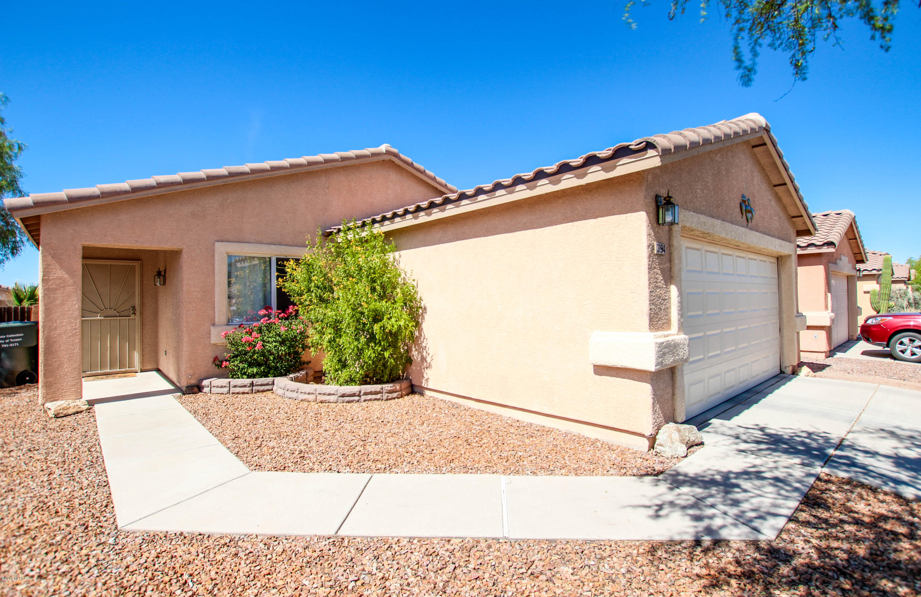 Charming 3bd/2bth home located in a great location near Grant Rd and Silverbell Rd. Easy access to I-10 and local shops and restaurants! The home has over 1100 SqFt and features carpet and ceramic tile throughout and is in a quiet neighborhood. Kitchen has plenty of counter and cabinet space, stainless steel dishwasher & refrigerator, and pantry.  Large master suite with ceramic tile floor and the master bath vanity with plenty of counter space. Double doors in the dining area leads out to the covered patio and backyard. Come out and see everything this amazing home and area have to offer!