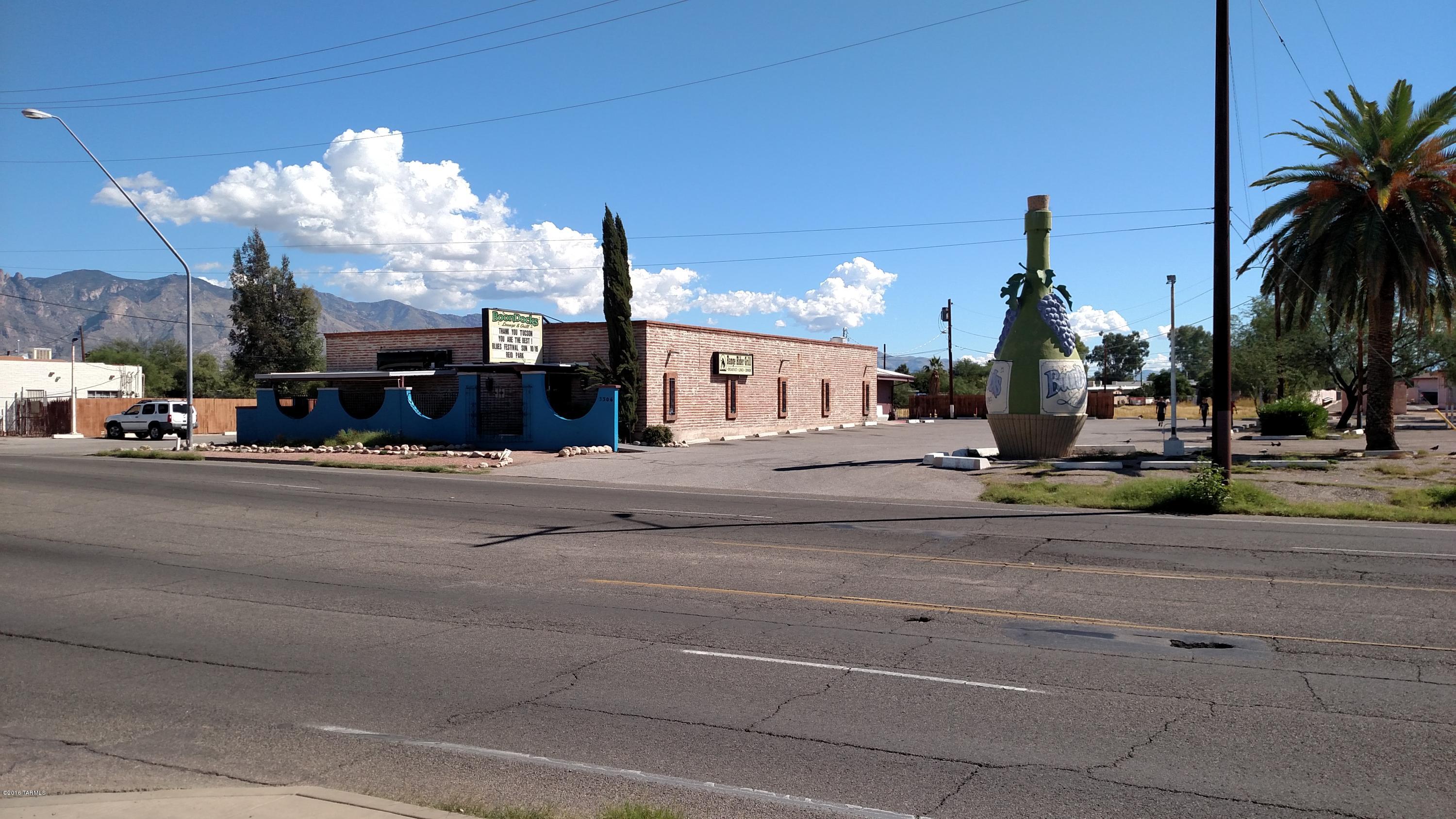 TUCSON ICON, BOONDOCKS LOUNGE, VENUE FOR TOURING BLUES ARTISTS.  4905 SQ/FT INCLUDES FULL SERVICE BAR AND COMMERCIAL KITCHEN W/VENT HOOD / FIRE SUPPRESSION & WALK-IN.  SITE IS APPROX. 29,260 SQ/FT WITH ADDITIONAL PARKING LOT LEASE FROM THE CITY OF TUCSON FOR APPROX. $165/MONTH FOR A TOTAL OF 88 PARKING SPACES.  INCLUDES OUTDOOR APPROVED SMOKING PATIO.  POOL TABLES & JUKE BOX LEASED DOES NOT CONVEY. SHOWN BY APPOINTMENT ONLY.