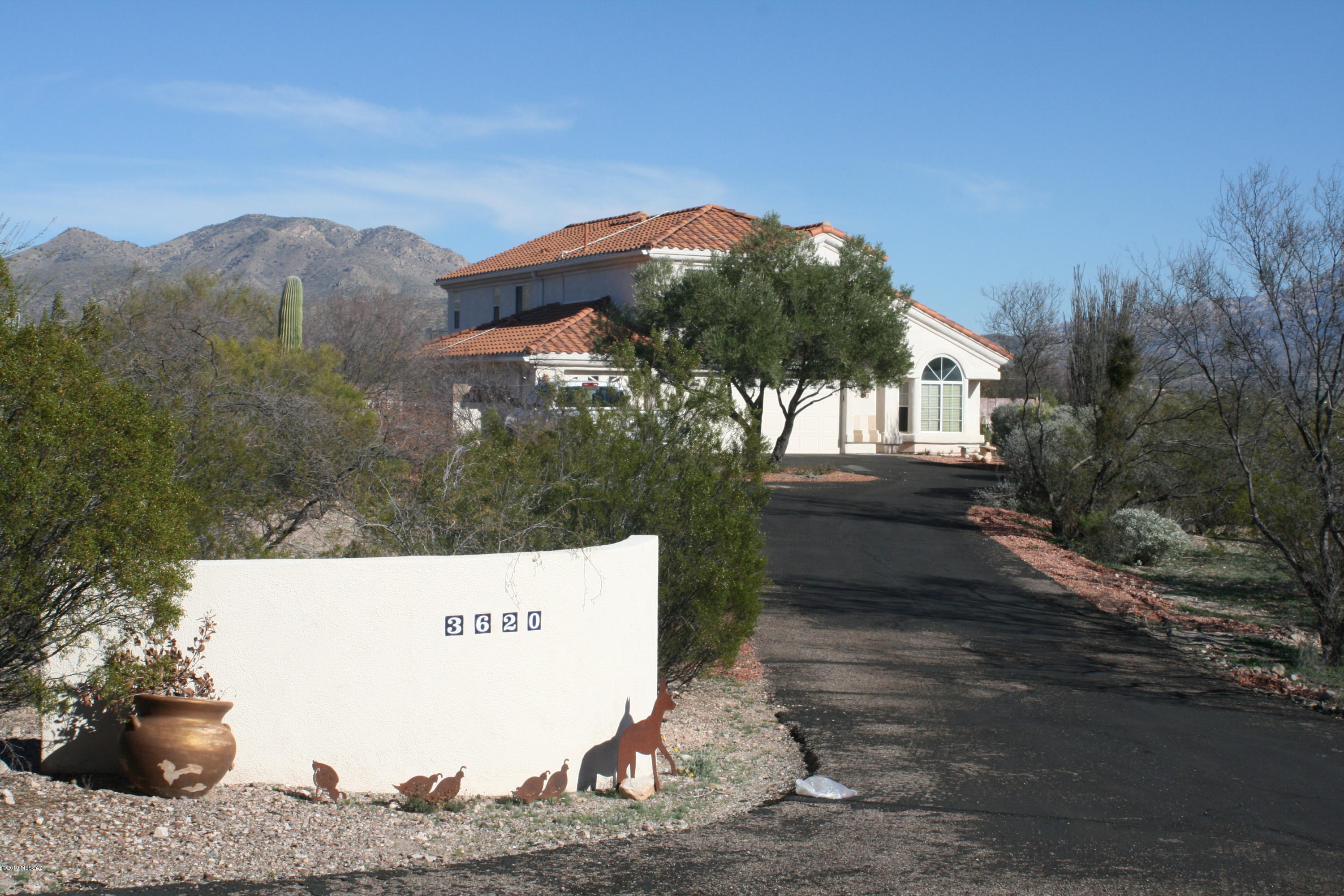 Incredible five bedroom home on over three acres of horse property.  This home has a 14.7 KW solar system installed by SolarSolutionsAZ.com included with the purchase which means you are ''net metering'' with the power company. So with a large home and with hardly an electric bill makes this a win win for the owner. The back patio and pool are walled and create a sweeping mountain view of the Catalina's. Talk about a kitchen! With granite countertops and newer stainless steel appliances along with a large pantry, this home is geared up to host many and dinner time. After dinner, relax by the wood burning Chimenea and take in the mountain views. This home is priced to sell and a great opportunity to own horse property in the Catalina foothills.