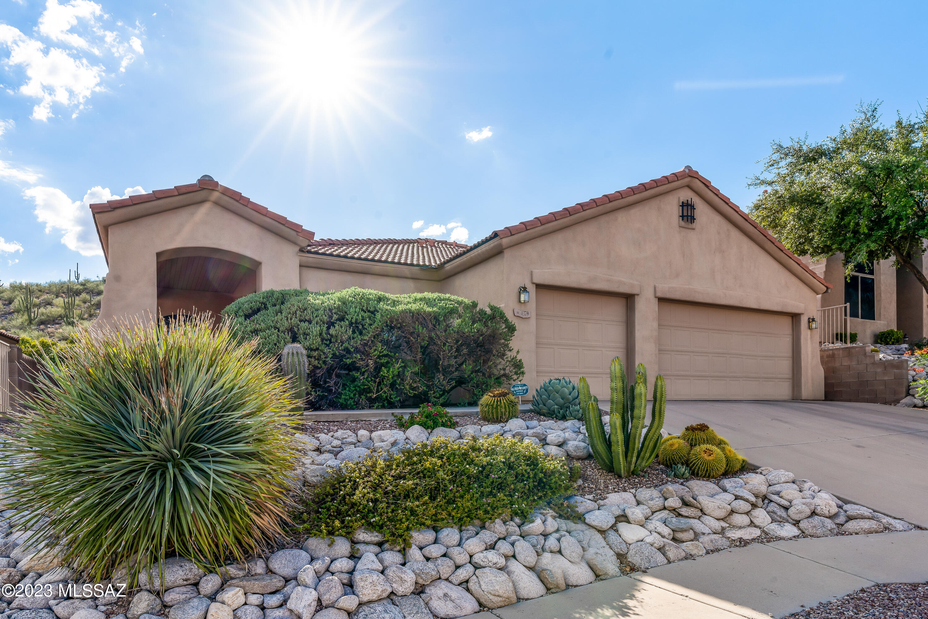 One of the Foothill's most sought after gated communities. Beautifully upgraded 3 Br, 2 Ba plus Den with wood floor, large  kitchen with granite countertops, Maple cabinets', gas stove and island in great room with built in entertainment center and gas fireplace, tiled floors except for bedrooms. Lots of windows, ceiling fans and all appliances plus Washer and dryer. Expansive flagstone patio, plush lawn, fruit trees, oversized 3 car garage backs to common area for total privacy.
Community pool on the right as you enter the main gate.   Owner pays for monthly landscaper. You will love this one!!