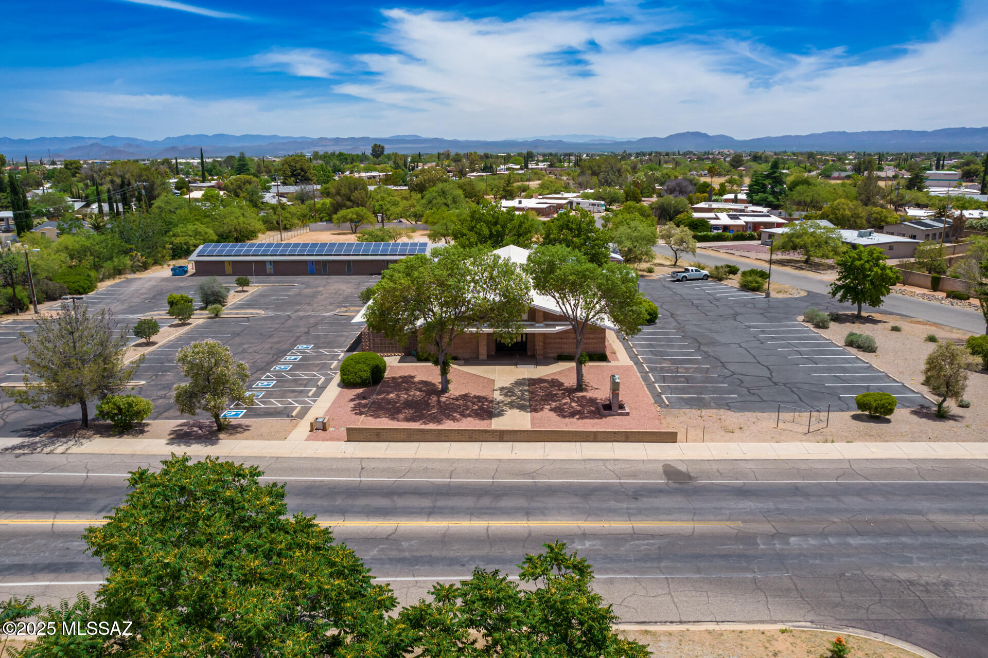 This spacious church property offers everything your congregation or business needs to grow and thrive.  Conveniently located in the Sierra Vista community, the property features a large church building, with numerous updates, a separate education building, including six separate classrooms, a playground, and plenty of parking.  It's ideal for worship services, educational programs, community events, and more.  The property is located on +/-2.62 acres which is partially fenced.