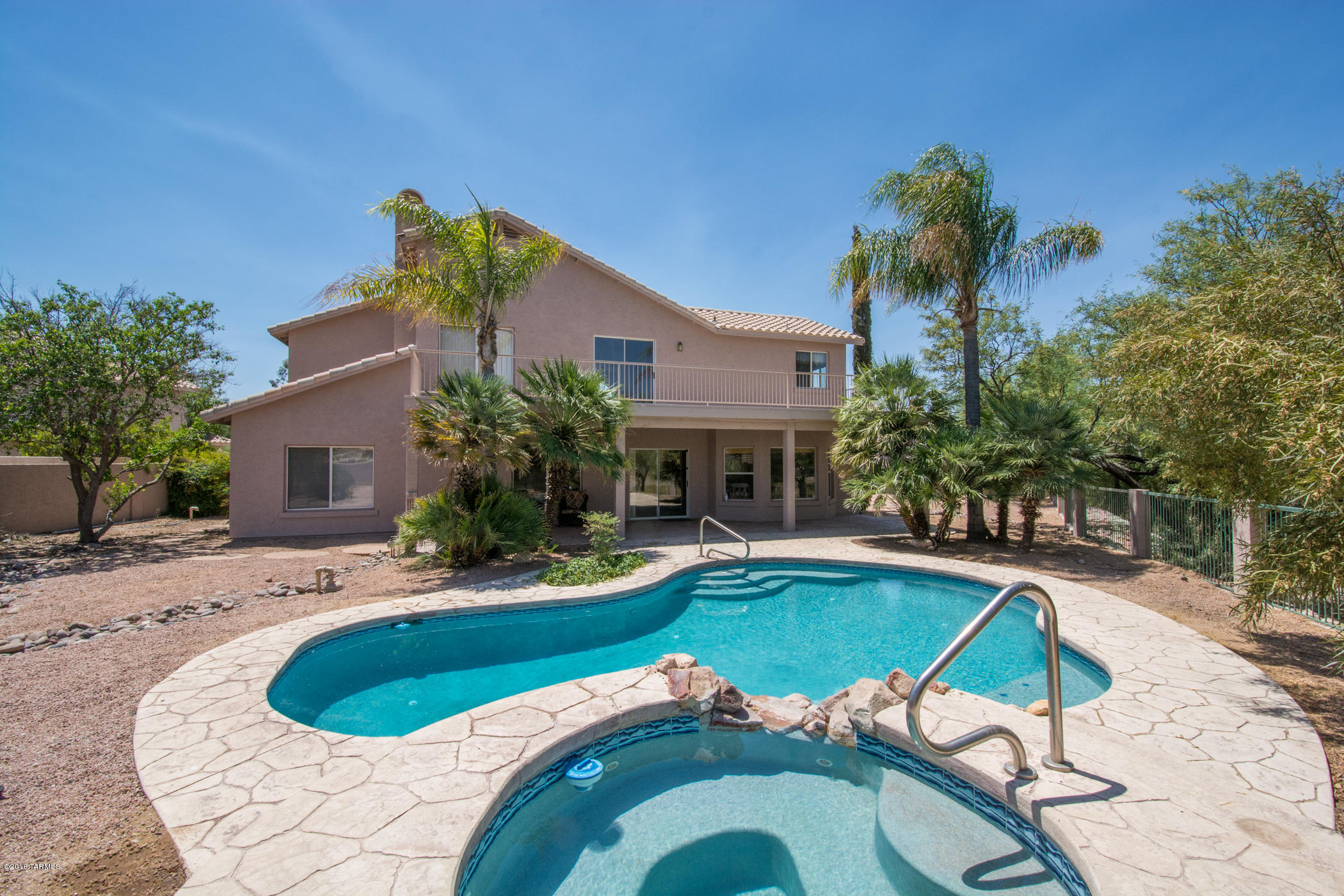 FABULOUS 5 BEDROOM/4 BATH HOME ON THE EL CONQUISTADOR GOLF COURSE. N/S DISPOSITION FOR MAXIMUM SHADE IN THE AFTERNOON. HIGH CEILINGS, TILED FLOORING, UPGRADED KITCHEN, FIREPLACE IN LARGE FAMILY ROOM, OPEN FLOORPLAN, SPACIOUS BEDROOMS AND GUEST BEDROOM DOWNSTAIRS WITH PRIVATE BATH AND SITTING AREA. ENJOY THE BEAUTIFUL SUNSETS FROM THE PRIVATE BALCONY OFF MASTER SUITE-OVERLOOKING THE SPARKLING POOL, SPA AND WATER FEATURE. UPGRADED TILED MASTER BATH. PREMIUM CORNER LOT SITS ON 13,939 SF! CLOSE TO SHOPPING, SCHOOLS, WALKING OR JOGGING PATH AND THE EL CONQUISTADOR GOLF CLUB FACILITY.
MATURE LANDSCAPE MAXIMIZES THE BEAUTY OF THIS HOME.