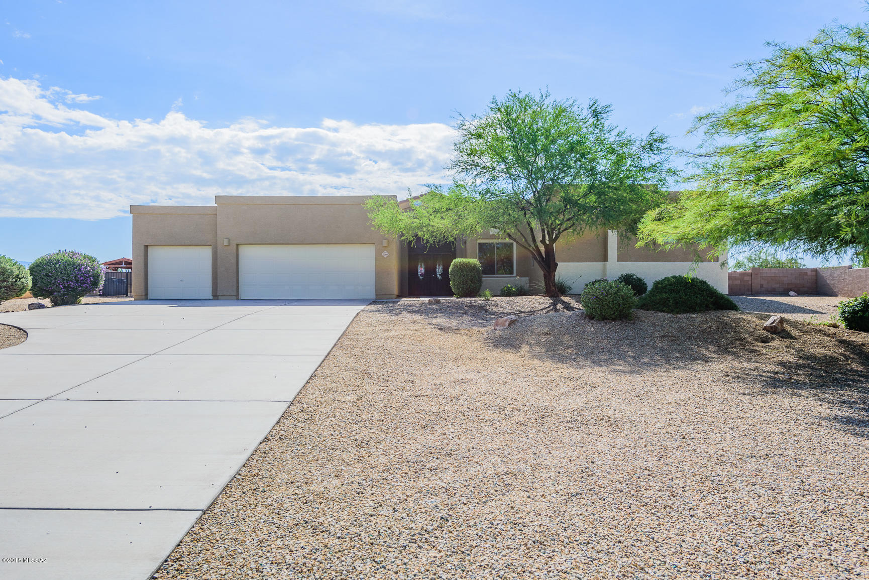 This private and spacious (over 3,000 SF) southwestern style home has it all! 4 bed/3bath. Huge fenced off back yard (approximately .92 of an acre) - RV parking available! 3 car garage! Breath-taking mountain views! Upgraded bathroom fixtures, spacious bedrooms, high ceilings throughout and a neutral paint palette give the home an open and airy feel. Family room boasts a cozy fireplace, built-ins and multiple windows for plenty of natural sunlight. Kitchen includes all the must-have items - SS appliances, granite countertops, large pantry, and tons of cabinet space for extra storage. Double doors lead you into a large master suite. Master bath includes a garden tub, separate shower, dual vanities and walk-in closets.