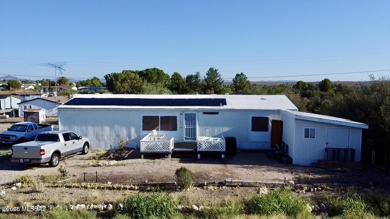 Enjoy cooler Northern Arizona living in this charming 3 bed 2 bath home conveniently located just 33 minutes from Anthem & 40 to Prescott! Right in the center of it all enjoy rural living but still close enough to the city!Nestled in a quiet small town you'll love the peaceful atmosphere without sacrificing convenience to city amenities.Built in 1990 this home features a spacious split bedroom floor plan perfect for privacy and functionality.The large backyard offers plenty of room for outdoor entertaining, gardening or simply relaxing under the open sky.Whether you're looking for a full-time residence or a weekend getaway this property delivers the best of both worlds tranquil living with easy access to nearby cities. Don't miss this opportunity to own a piece of Northern Arizona charm!