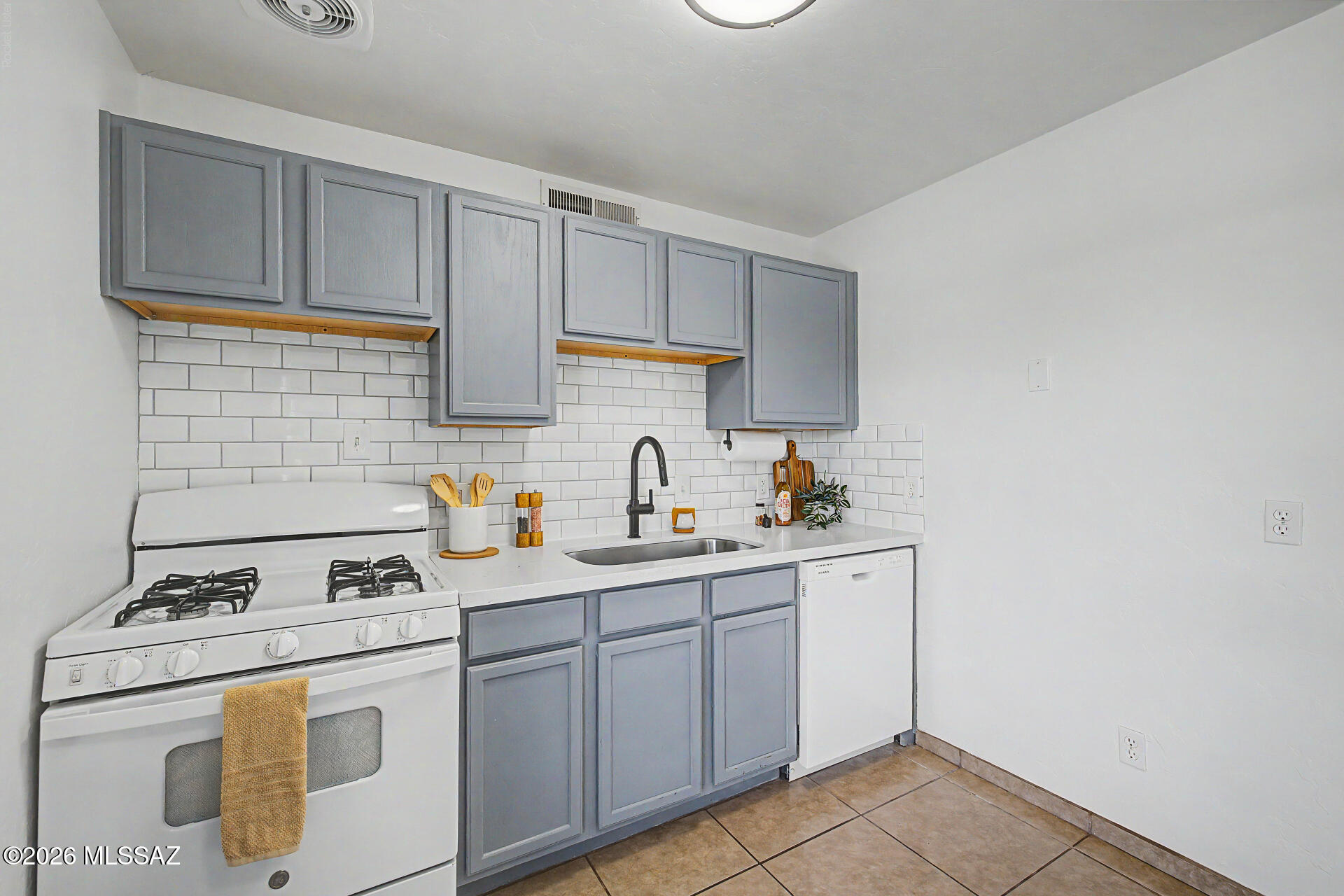 Welcome to this beautifully maintained 2-bedroom, 1-bath condo located in the gated Sunset Foothills community on Tucson's desirable west side. This move-in-ready home offers 720 square feet of comfortable living space featuring an updated kitchen, spacious living area, in-unit laundry, and a private covered patio perfect for enjoying Arizona's year-round sunshine. Recent improvements include modern finishes, updated bathroom features, and energy-efficient systems for added comfort and convenience. Residents enjoy access to outstanding community amenities including a sparkling pool and spa, clubhouse, basketball court, picnic and grilling areas, playground, and beautifully maintained common grounds The HOA covers exterior maintenance, roof maintenance, pest control, and community upkeep, providing low-maintenance living.
Ideally situated just minutes from Downtown Tucson, the University of Arizona, Pima Community College, St. Mary's Hospital, Tumamoc Hill, I-10, shopping, dining, and entertainment, this property offers an exceptional combination of convenience, comfort, and value. Whether you're searching for a primary residence, seasonal retreat, or investment opportunity, this westside gem is one you won't want to miss.
