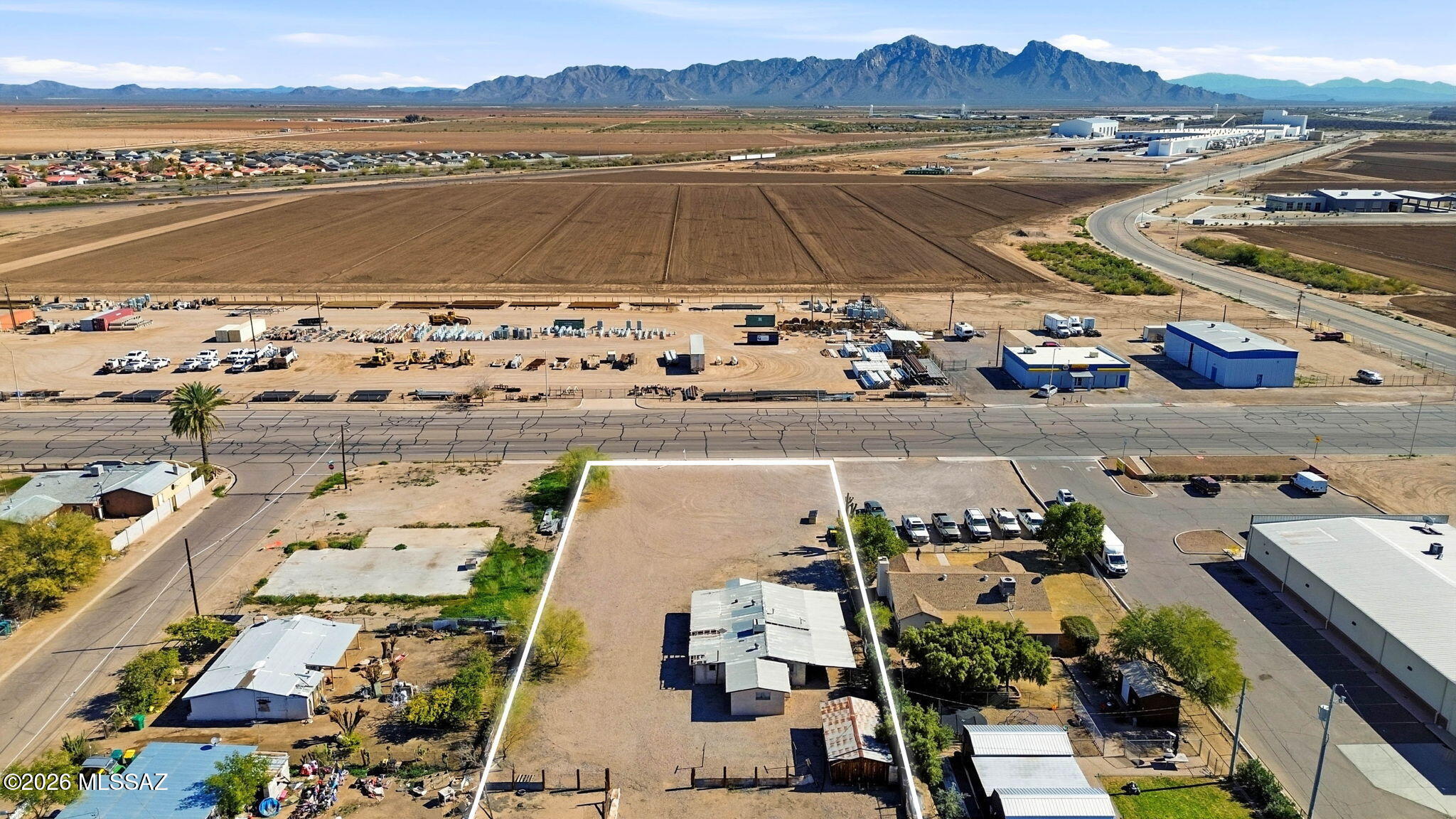 High value proposition with location, zoning, and access upside. Strategic location near I-10 with access to Phoenix & Tucson. Zoned for industrial/light commercial uses. Utilities on site. Located in a strong growth corridor in Pinal County, Ideal for logistics, manufacturing, or storage/parking. Flat, developable parcel with existing curbing at driveway. Located in an opportunity zone.