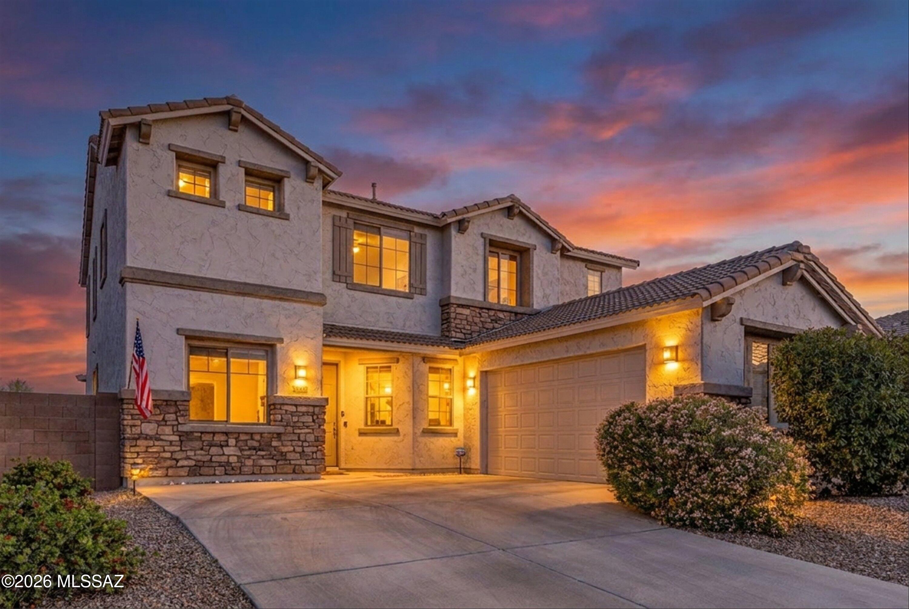Resort-style living meets space, flexibility, and thoughtful design in this stunning 6BD/3BA, 3,464 SF home tucked at the end of a quiet cul-de-sac in Rancho Vistoso's sought-after Somerset Canyon.
From the moment you walk in, the home feels open, bright, and incredibly functional. The layout offers both a formal living room and an expansive family room that flows seamlessly into the kitchen, creating a true great room feel that's perfect for everyday living and entertaining. Large windows and sliding glass doors bring in natural light and connect effortlessly to the backyard and pool--enhancing the indoor-outdoor lifestyle buyers are looking for.
The kitchen sits at the center of it all, designed for both function and style. Granite countertops, an oversized island with bar seating, stainless appliances, gas range, and warm maple cabinetry provide ample storage and workspace. A window over the sink looks directly out to the backyard, keeping everything connected whether you're hosting or enjoying a quiet night in.
The main level continues to impress with a split bedroom floor plan, offering two bedrooms and a full bath--ideal for guests, multigenerational living, or a private secondary living space. Also on this level is a dedicated media and recreation room, currently showcased as a golf simulator, offering a flexible space that can easily function as a theater, game room, fitness area, or den.
Upstairs opens into a spacious loft, offering a versatile area perfect for a playroom or relaxed lounge. The primary suite is positioned for privacy and comfort, featuring beautiful mountain views, a spacious layout, and a spa-like bath with a soaking tub set beneath a picture window, a separate walk-in shower, and generous closet space.
Four additional bedrooms upstairs are thoughtfully sized, with one currently used as an office--ideal for work-from-home needs, study space, or a quiet retreat. The upstairs laundry room is conveniently located where it's needed most, making everyday living more efficient.
Step outside and the home truly shines.
The backyard is designed for Arizona living, featuring a private pool, extended covered patio, pergola, and low-maintenance turf. Multiple seating and entertaining areas create a space that feels both functional and inviting. Whether it's quiet mornings, pool days, or evenings under the desert sky, this is where life happens.
Located in Rancho Vistoso, residents enjoy scenic walking and biking paths, nearby parks, golf, and the natural beauty that makes this area so desirable--while still being just minutes from dining, shopping, and everyday conveniences.
Homes that offer this combination of space, layout, unique features, and true indoor-outdoor living are hard to find--especially in this location.