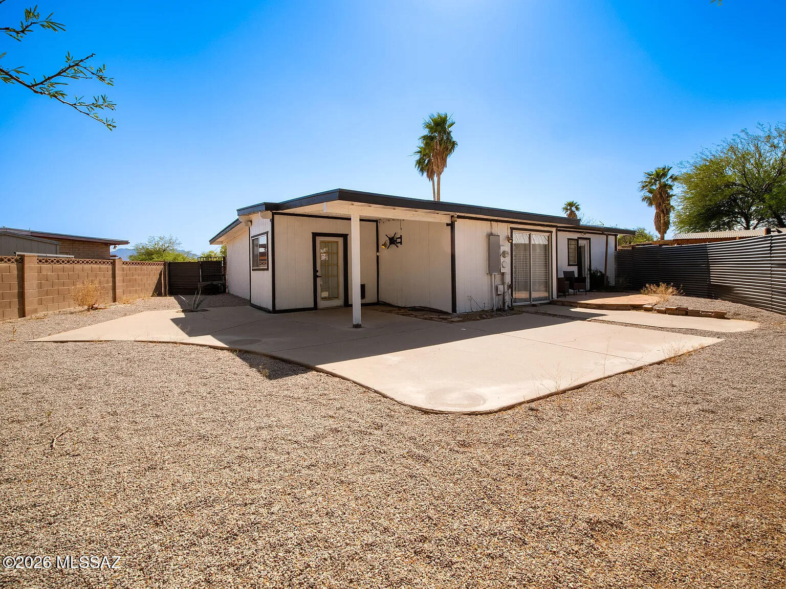 Beautiful fully furnished home in NW Tucson! Situated on a huge lot with no HOA, and rare for the area, a GUEST HOUSE, this property offers well-manicured landscaping, privacy, and exceptional versatility.
The main home features numerous upgrades throughout, including an updated kitchen and bathrooms, double-pane windows, updated flooring, and multiple skylights. The oversized extended, insulated garage is a car lover's dream, complete with new cooler, built-in air lines, an external compressor for noise suppression, 220v for high power tool, and wiring for a welder -- offering the perfect setup for automotive enthusiasts, hobbyists, or workshop space.
A standout feature of the property is the detached tiny home guest house with a loft, covered BBQ area, private street entry that is currently rented on a month-to-month basis. Thoughtfully designed with smart home features, the guest home includes 1 bedroom, 1 bathroom, a full kitchen, a private entrance, and efficient use of space, making it ideal for rental income, multigenerational living, guests, or a private home office retreat.
This unique property combines comfort, flexibility, and investment potential in one of Northwest Tucson's sought-after areas.