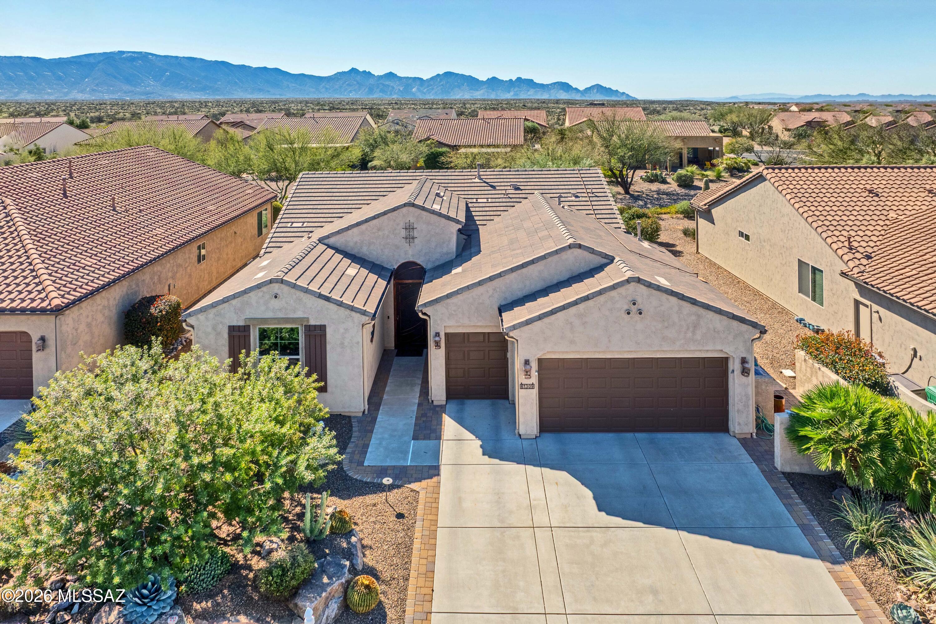 Ideally located close to the exceptional amenities of SaddleBrooke Ranch, this beautifully upgraded Hermosa plan offers bright, open living with 8' interior doors throughout and a clean, neutral palette.

The light-filled kitchen features upgraded cabinetry, abundant storage, and a gas range--perfect for everyday living and entertaining. The den with double doors includes a Murphy bed that conveys, providing flexible space for guests or a home office. The spacious primary suite offers an upgraded custom closet system designed for organization and ease.

Outdoor living is a true highlight with a charming back patio fireplace and mantle, rolling shades for year-round enjoyment, and a covered pergola area ideal for a future hot tub or outdoor kitchen.

Additional features include: " Golf cart garage with 4' extension
" Extended driveway
" Extended laundry room
" Owned solar for energy efficiency and long-term savings

A fantastic opportunity in one of SaddleBrooke Ranch's most desirable and convenient locations.