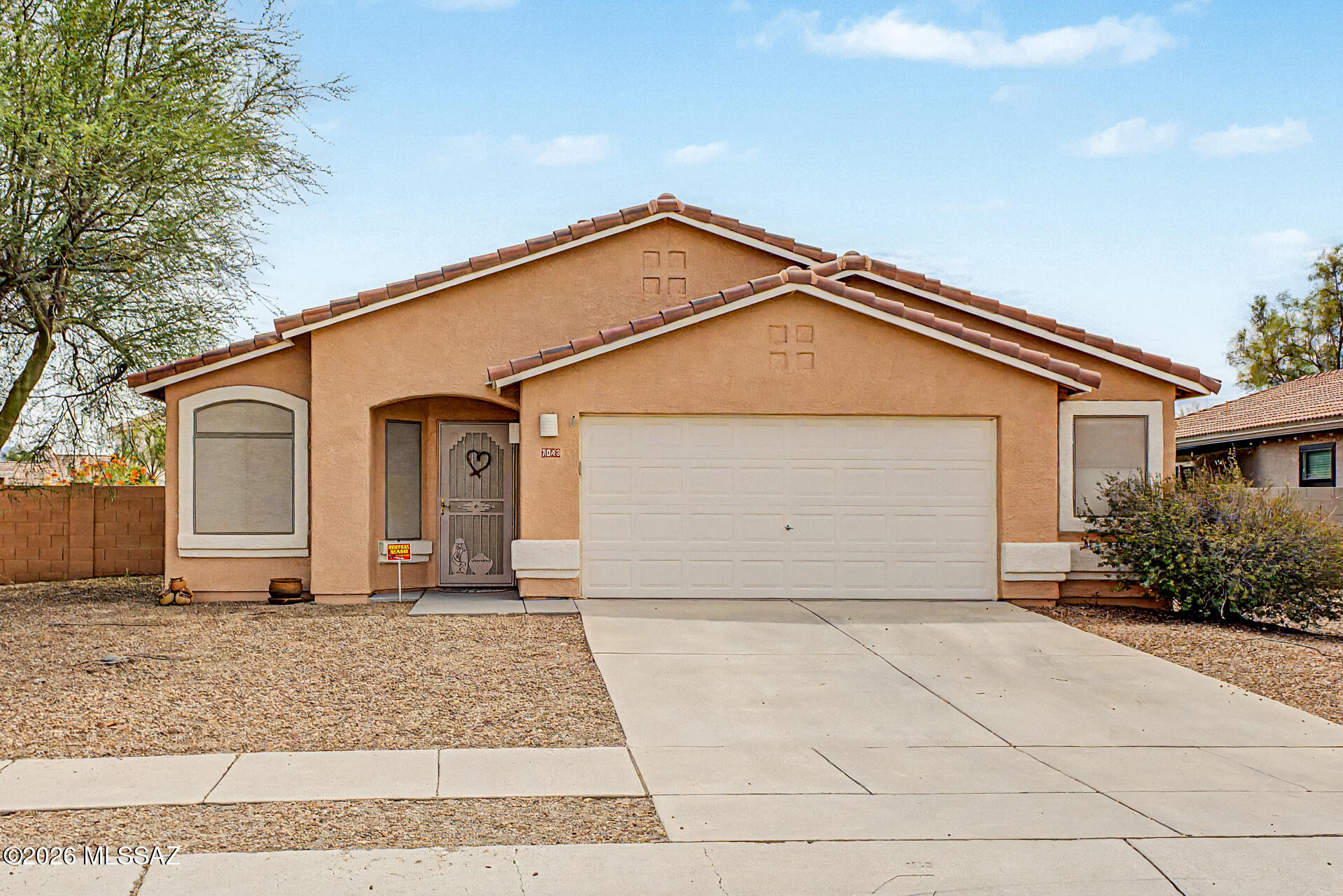 Welcome home to this 3-bedroom, 2-bathroom residence in the highly desirable Continental Ranch community. Designed with comfort and functionality in mind, the spacious open-concept floor plan showcases vaulted ceilings, creating a bright and inviting living and dining area that's perfect for both everyday living and entertaining. The well-appointed kitchen features generous counter space, a kitchen island, abundant cabinetry, and plenty of room for meal preparation and gathering. The private primary suite offers a spacious walk-in closet and a relaxing en-suite bathroom complete with dual vanities, a soaking tub, and a separate shower. Two additional bedrooms share a full hall bath, providing flexibility for family or guests. An interior laundry room includes the washer and dryer for added convenience. Step outside to enjoy the private backyard, ideal for outdoor entertaining or relaxing, while the attached two-car garage offers ample storage space for vehicles, tools, and recreational equipment. This home combines thoughtful design, exceptional care, and a sought-after location. Schedule your private showing today!