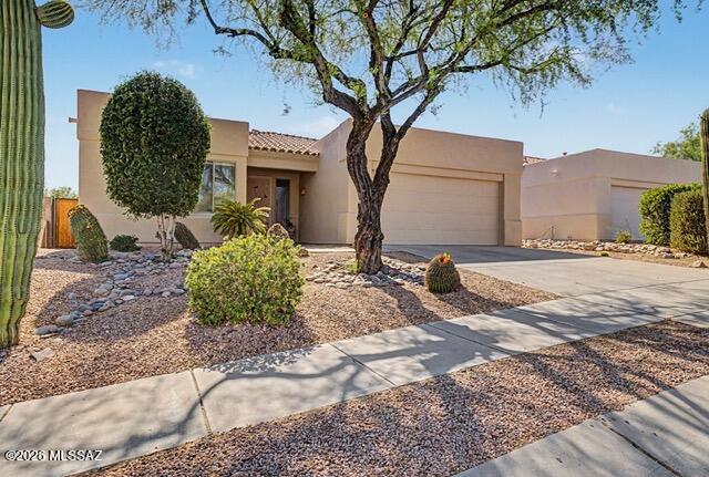 Range pricing-Seller will entertain and respond to offers between 450K-475K. Welcome to Arizona National, one of Tucson's premier guard-gated golf course communities, nestled in the scenic Catalina Foothills and surrounded by breathtaking golf course and mountain views. This beautifully maintained 1,814-square-foot home offers a desirable split-bedroom floor plan with 3 bedrooms, 2 bathrooms, and a 2-car garage, blending comfort, style, and an exceptional lifestyle. Recent improvements include a new roof, new carpet throughout, fresh interior and exterior paint, a new stove, microwave, dishwasher, and updated window treatments, making this home truly move-in ready. Perfectly positioned along the 14th fairway, this peaceful setting is ideal for relaxing or entertaining. The thoughtfully designed split-bedroom floor plan provides privacy, while the open living spaces are filled with natural light and showcase the picturesque scenery. Enjoy Arizona's year-round outdoor lifestyle from the covered patio, where the majestic Catalina Mountains create a stunning backdrop. Community & Lifestyle Arizona National Golf Resort is adjacent to Canyon Ranch, one of the nation's premier wellness resorts. Residents enjoy access to golf, dining, swimming, fitness opportunities, and an active outdoor lifestyle. The surrounding area offers convenient access to hiking and biking trails, Sabino Canyon Recreation Area, shopping, dining, healthcare facilities, and Tucson's many cultural attractions. Whether you're seeking a full-time residence, a winter retreat, or a lock-and-leave seasonal home, this property offers the ideal blend of resort-style living and low-maintenance convenience. Experience the beauty of the Sonoran Desert, stunning Catalina Mountain views, year-round sunshine, and the active lifestyle that makes Arizona National one of Tucson's most desirable communities.
