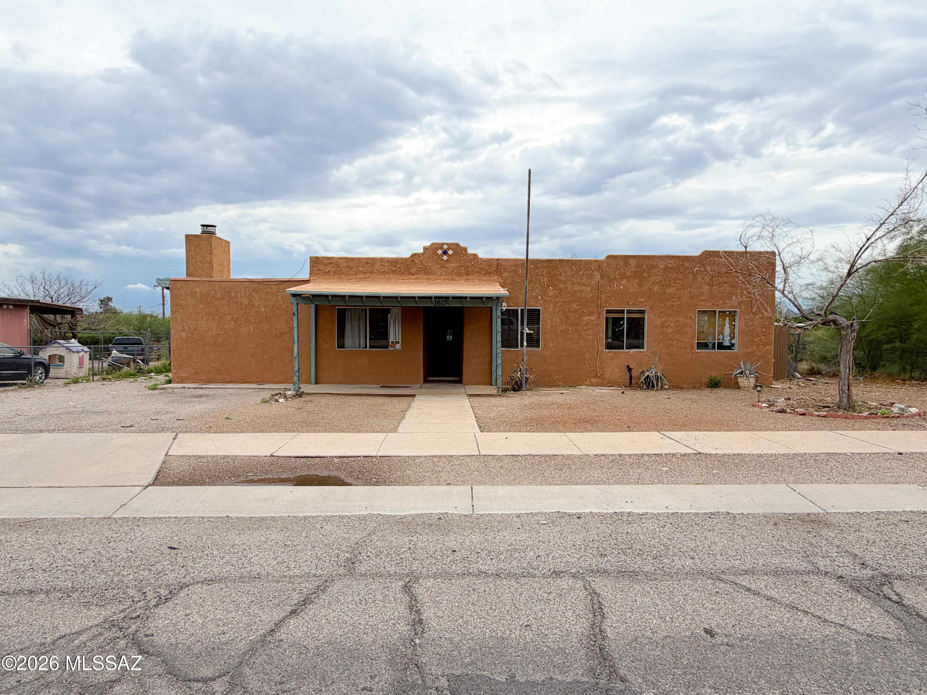 LOOKING FOR A FIX-UP OPPORTUNITY??? This is it! Spacious floor plan with 4 br/ 2ba and a cozy fireplace. Great West side location with easy access to I-10, U of A and Pima Community College. HUGE lot with endless possibilities!! Bring your best offer!