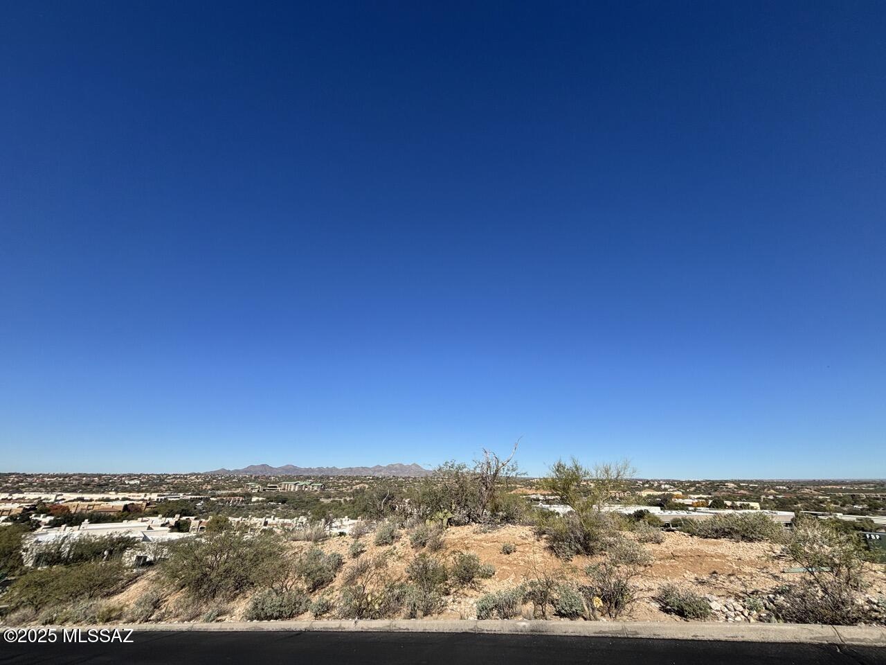 Nestled on a quiet cul-de-sac in the coveted La Reserve community, this prime homesite offers stunning Pusch Ridge views to the south and beautiful Oro Valley vistas to the west. With utilities already available, it's the perfect opportunity for builders, investors, or future homeowners to create a custom dream home. A rare chance to build in one of Oro Valley's most sought-after neighborhoods—don't miss it!