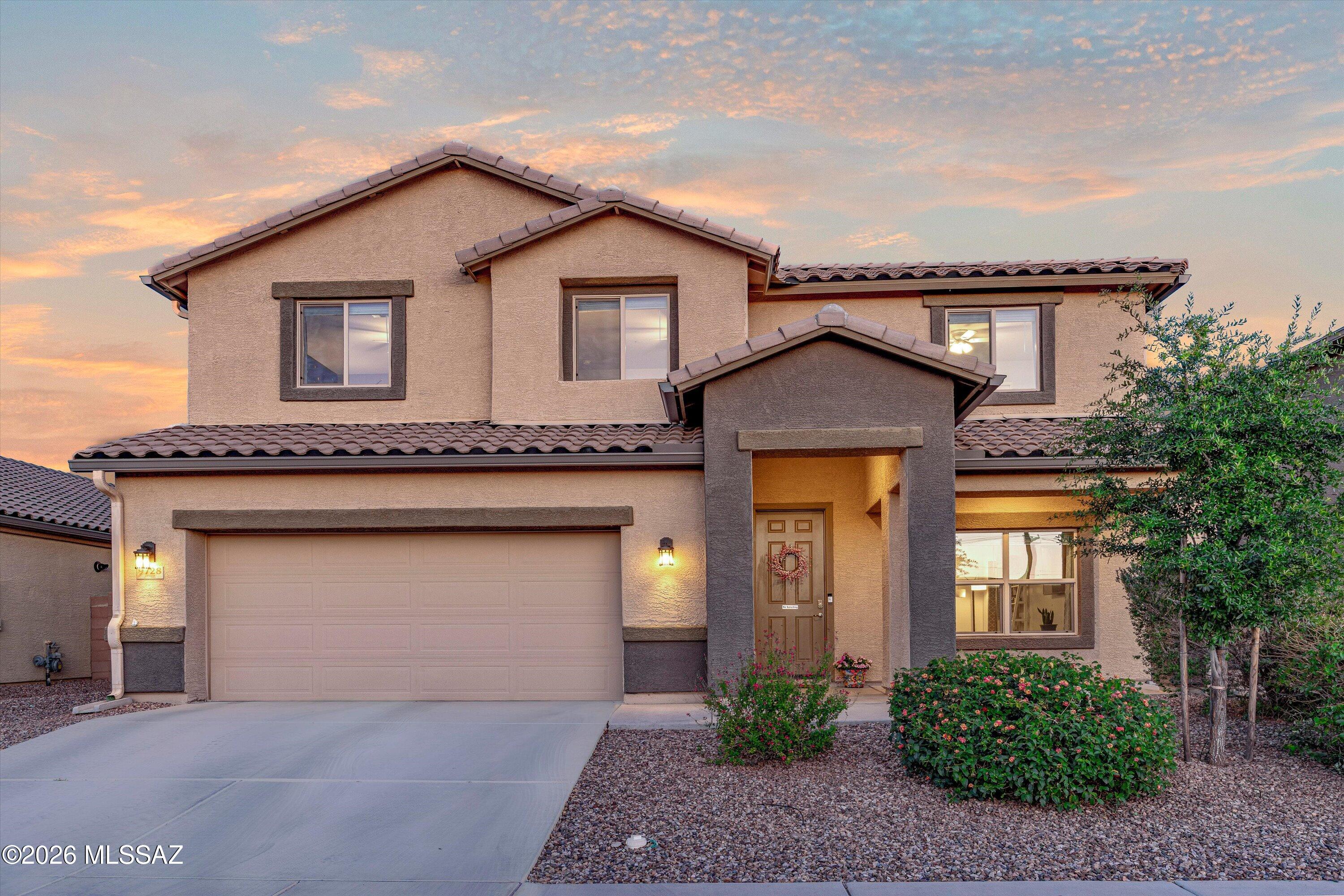 Stunning 6BD/3BA, 3,449 sq ft two-story home loaded with upgrades and thoughtfully designed living space! Features include formal living room, floor-to-ceiling tiled fireplace, dedicated den, spacious loft, and charming coffee bar. The gourmet kitchen showcases white cabinetry, granite countertops, subway tile backsplash, ss appliances, gas range, and oversized island with bar seating. Spacious primary suite plus 5 additional bedrooms provide flexibility for guests, work, or hobbies. Enjoy year-round comfort with a whole-house humidifier. Step outside to your private backyard with covered patio, artificial turf, and multiple seating areas. Resort-style community amenities include a sparkling pool, fitness center, clubhouse, dog park, park & walking trails!