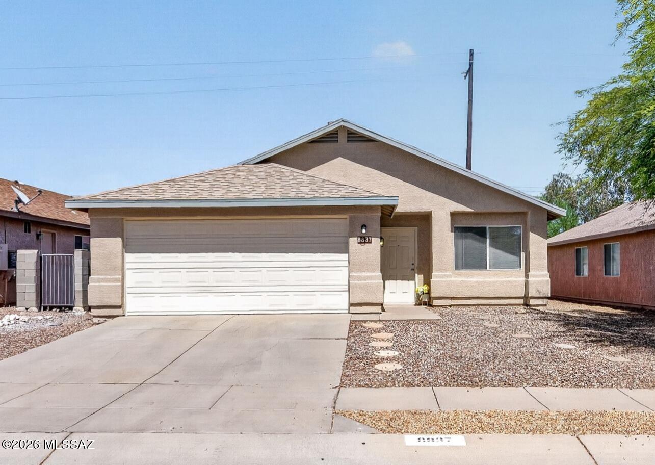 This charming 4 bed/2 bath home in the award-winning Vail School District has been beautifully updated & is move-in ready. Fresh exterior paint including side gates (2026), fresh interior paint (2026), all new window coverings & screens (2026), plus brand new carpet & padding in bedrooms (2026). Tile flooring throughout main areas, granite counters in the kitchen & included fridge, washer/dryer. Recently serviced HVAC, AprilAire 5000 whole-house air purifier (MERV 15 equivalent), MERV 13 pre-filter, & water softener for comfort. Spacious owner's suite with walk-in closet & spa-inspired owner's bath featuring double vanity & whirlpool tub. Additional updates include new landscape rock in the rear yard (2026) and low-maintenance desert landscaping. Don't miss this turnkey single-story home!