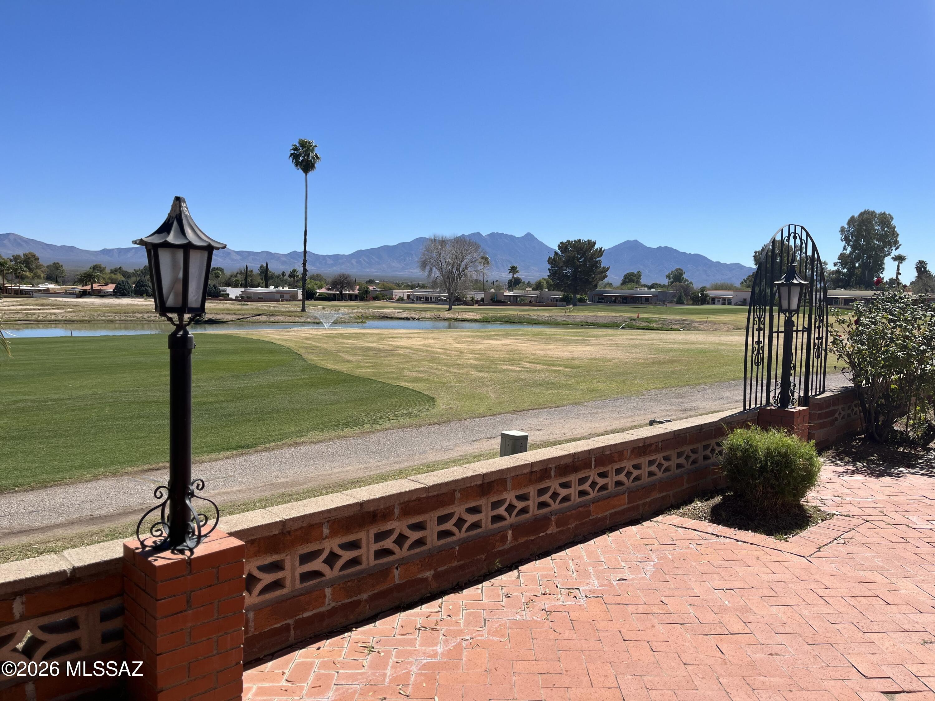 Stunning golf course and Santa Rita Mountain views.  Spacious 2,449 square foot home with 2-bedrooms and 2 baths.  Formal dining space, eat-in kitchen.